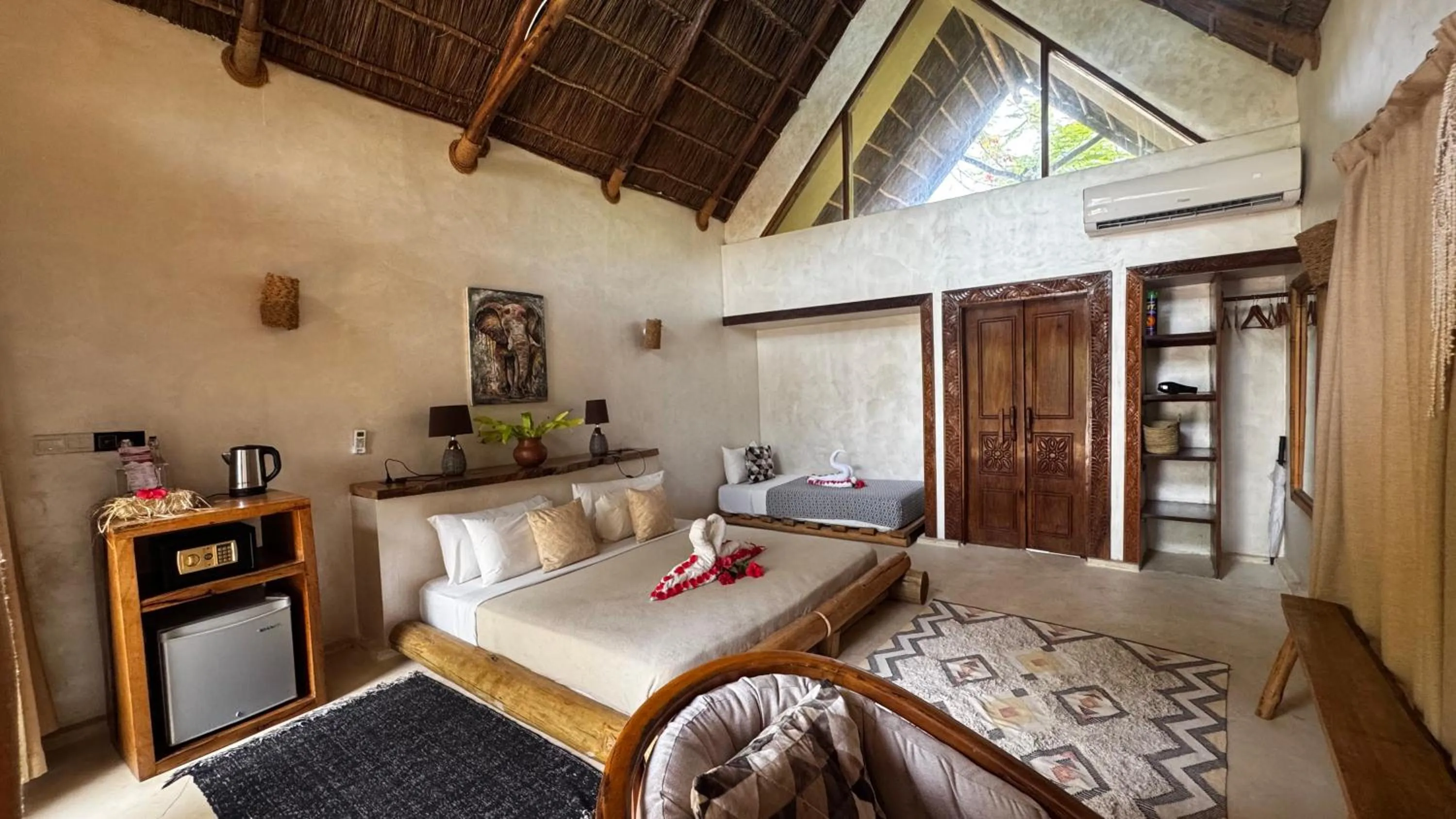 Bed in The Nest Tropical Oasis Resort