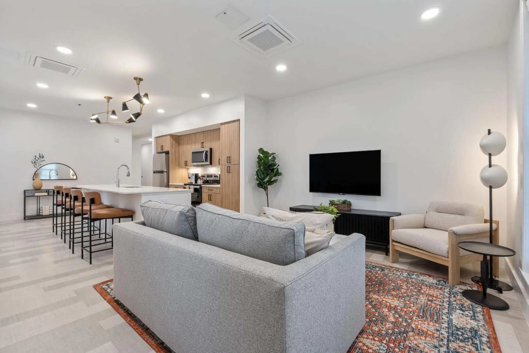 Living room in The Continental, powered by Placemakr - Downtown - Market Square