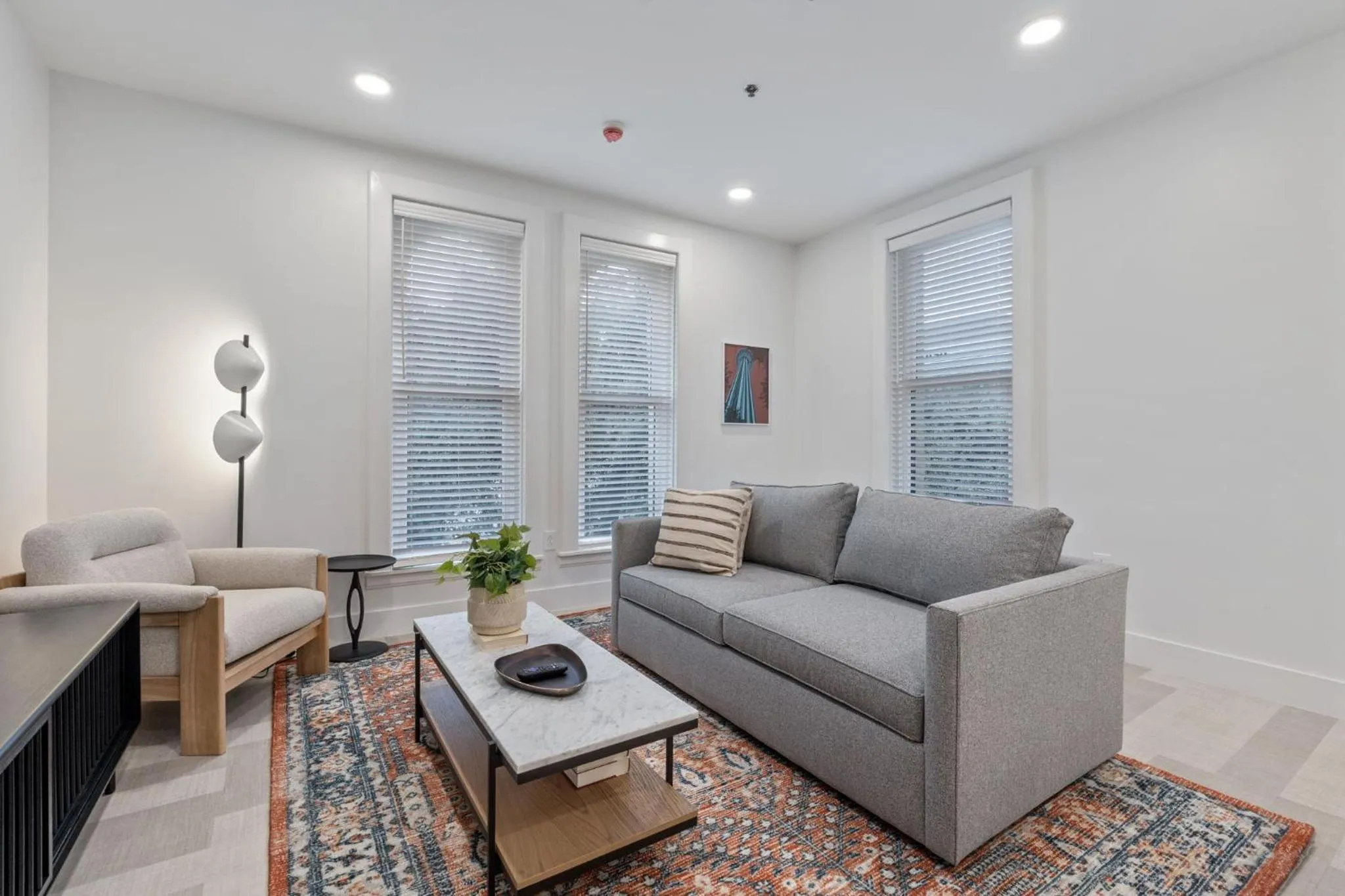 Living room in The Continental, powered by Placemakr - Downtown - Market Square