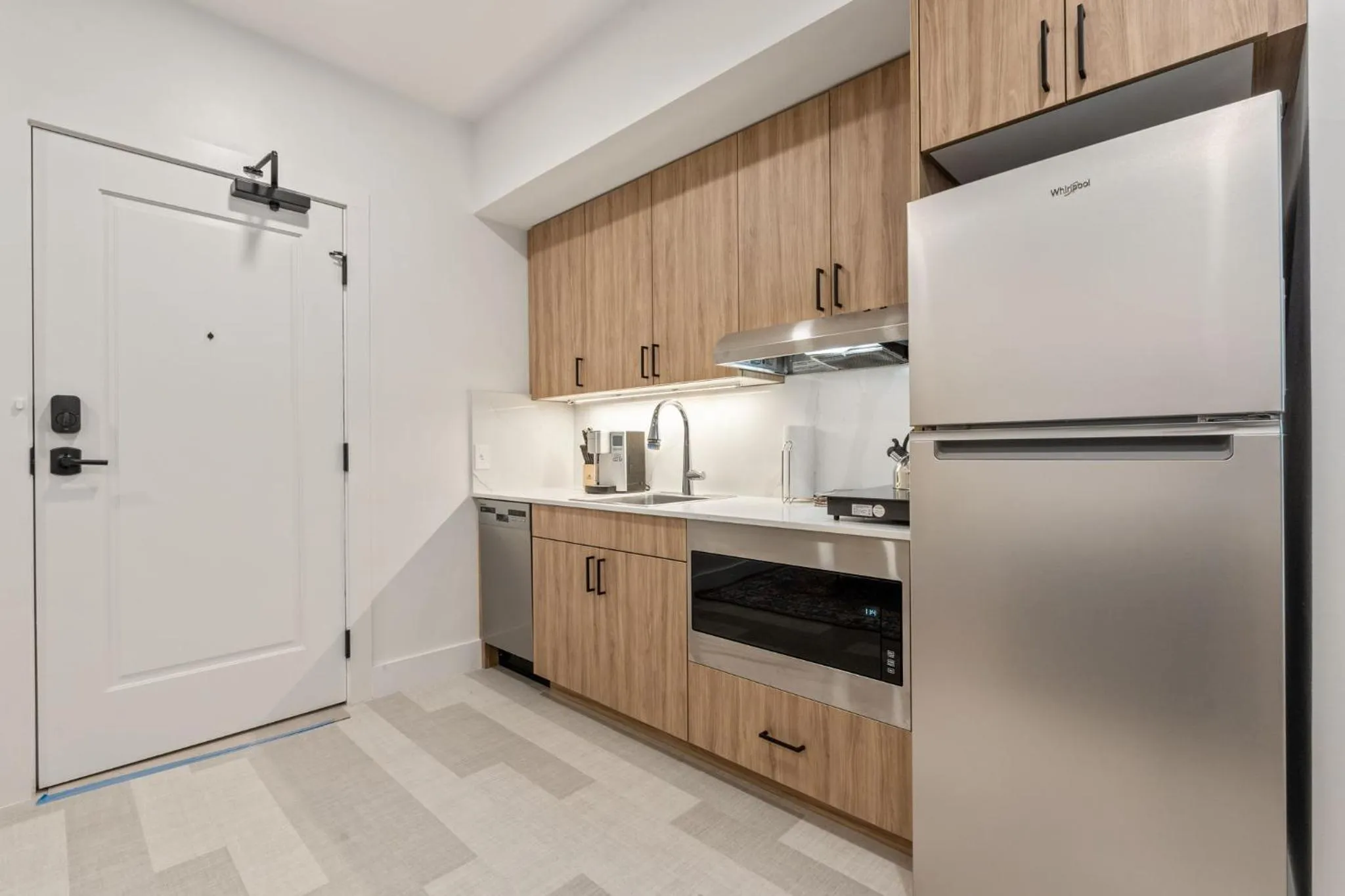 Kitchen or kitchenette in The Continental, powered by Placemakr - Downtown - Market Square