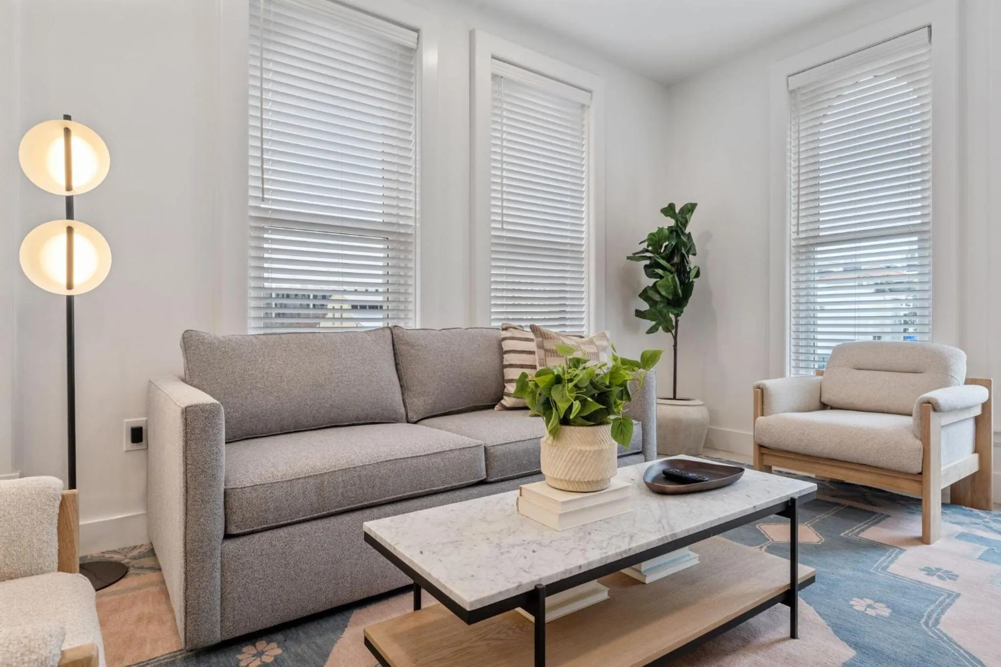 Living room in The Continental, powered by Placemakr - Downtown - Market Square