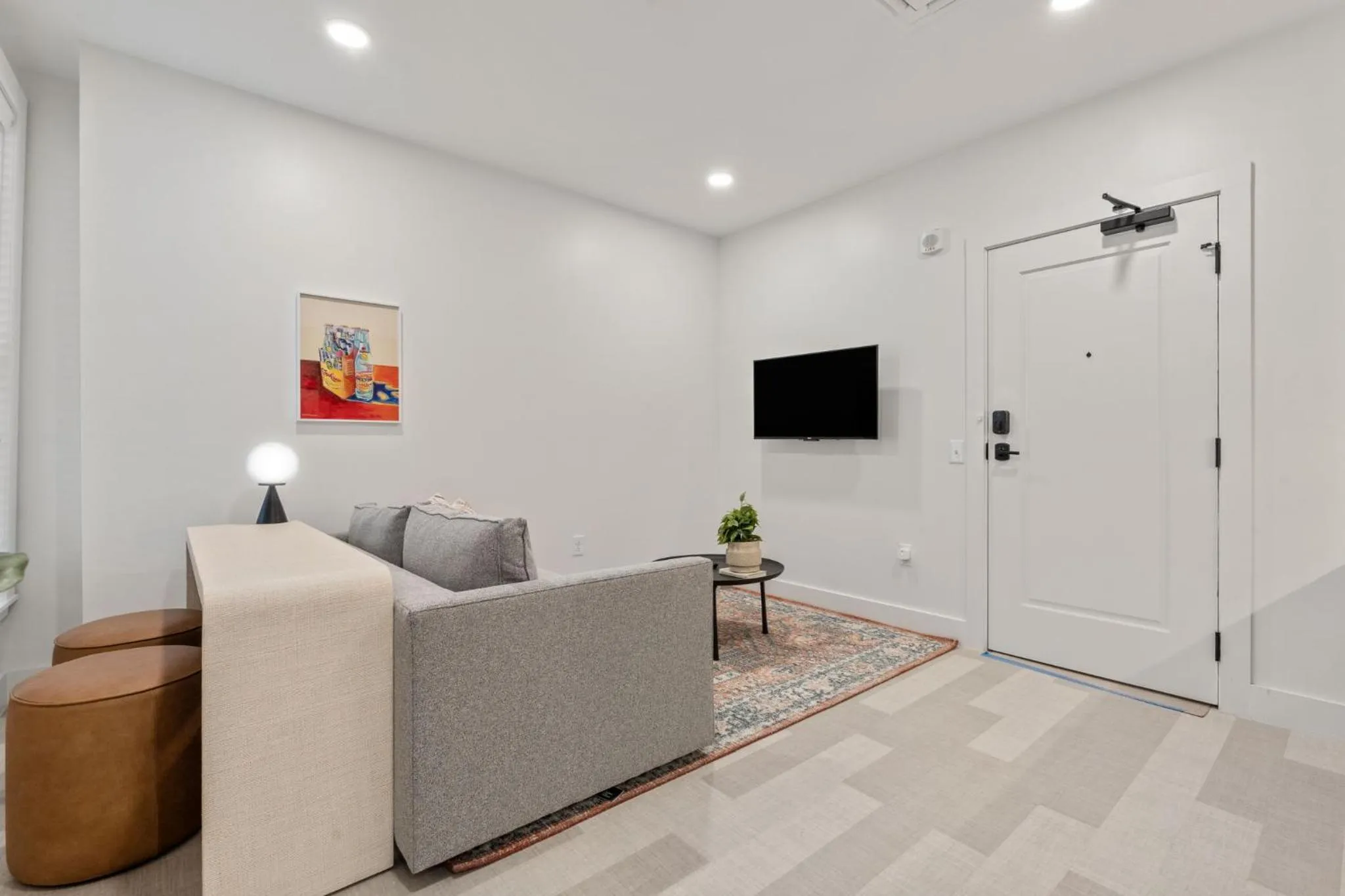 Communal lounge/ TV room in The Continental, powered by Placemakr - Downtown - Market Square