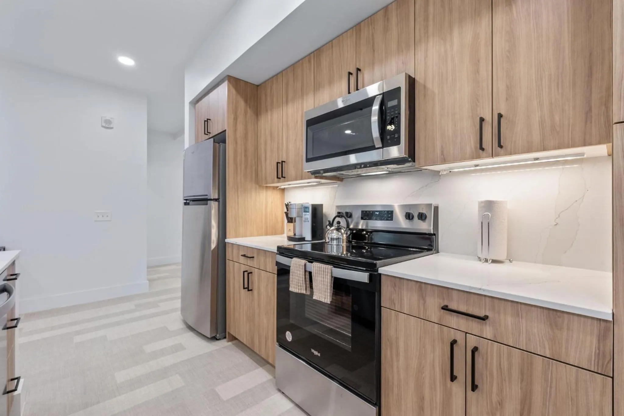 Kitchen or kitchenette in The Continental, powered by Placemakr - Downtown - Market Square