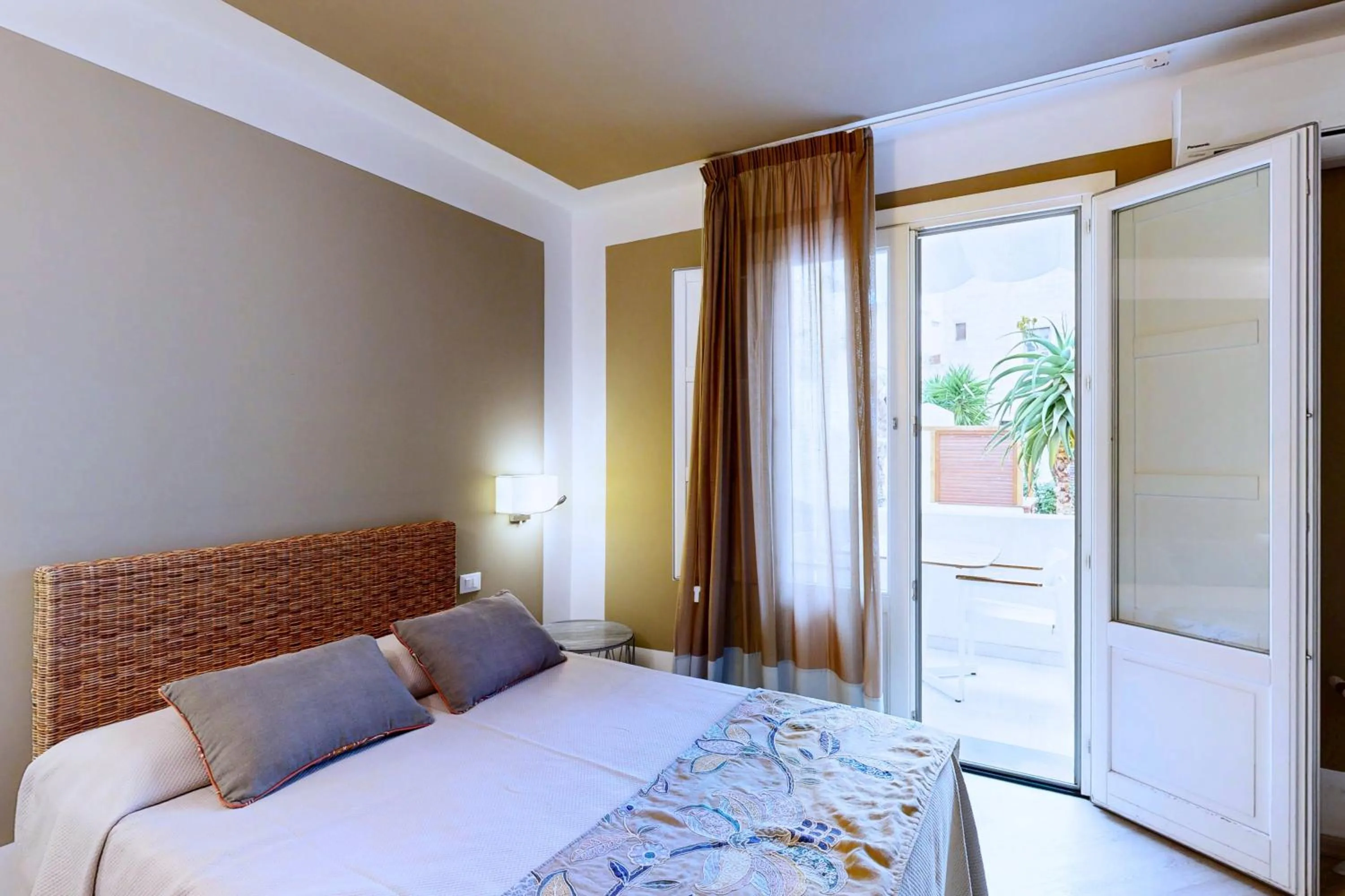 Balcony/Terrace, Bed in Aegusa Hotel