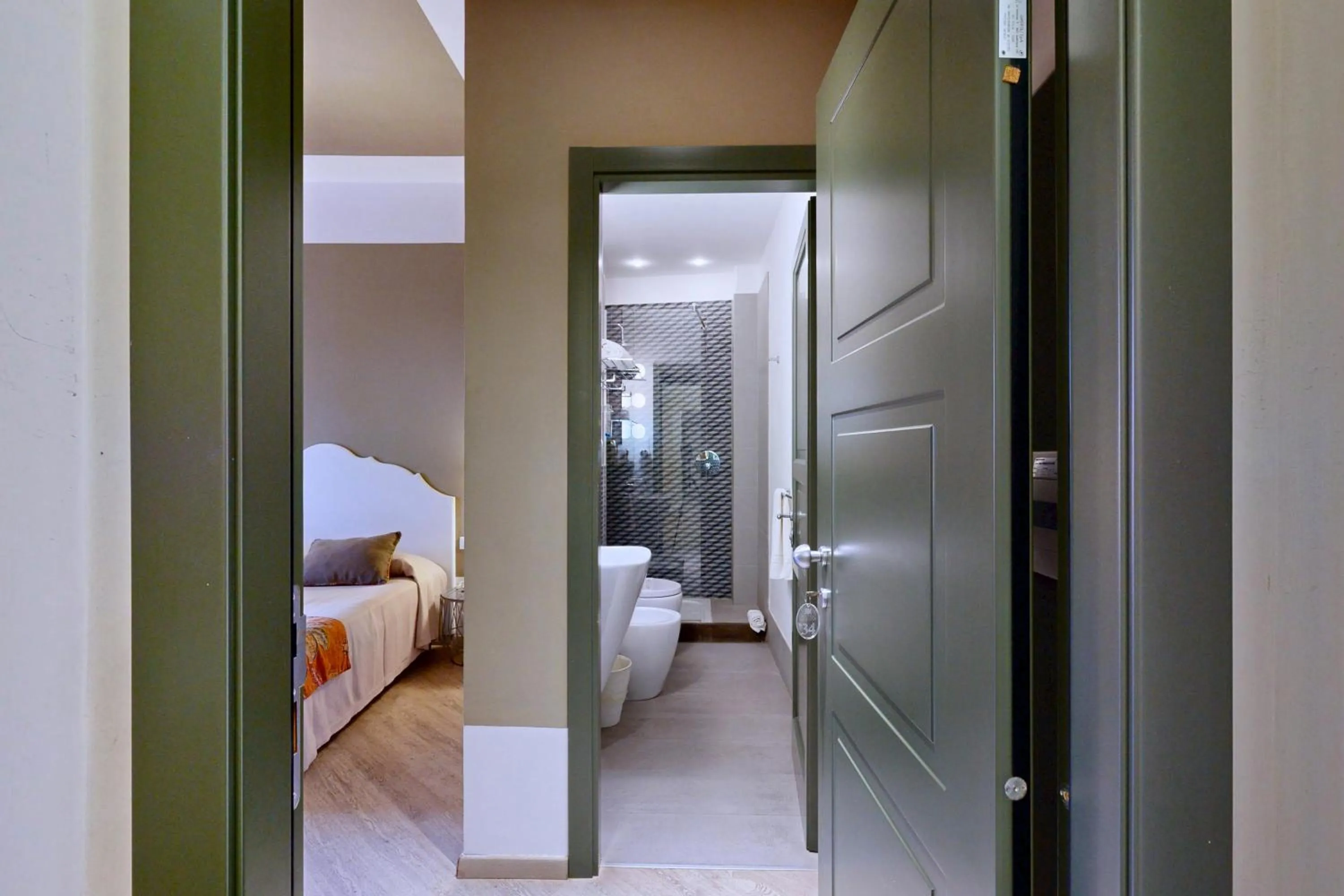 Bathroom, Bed in Aegusa Hotel