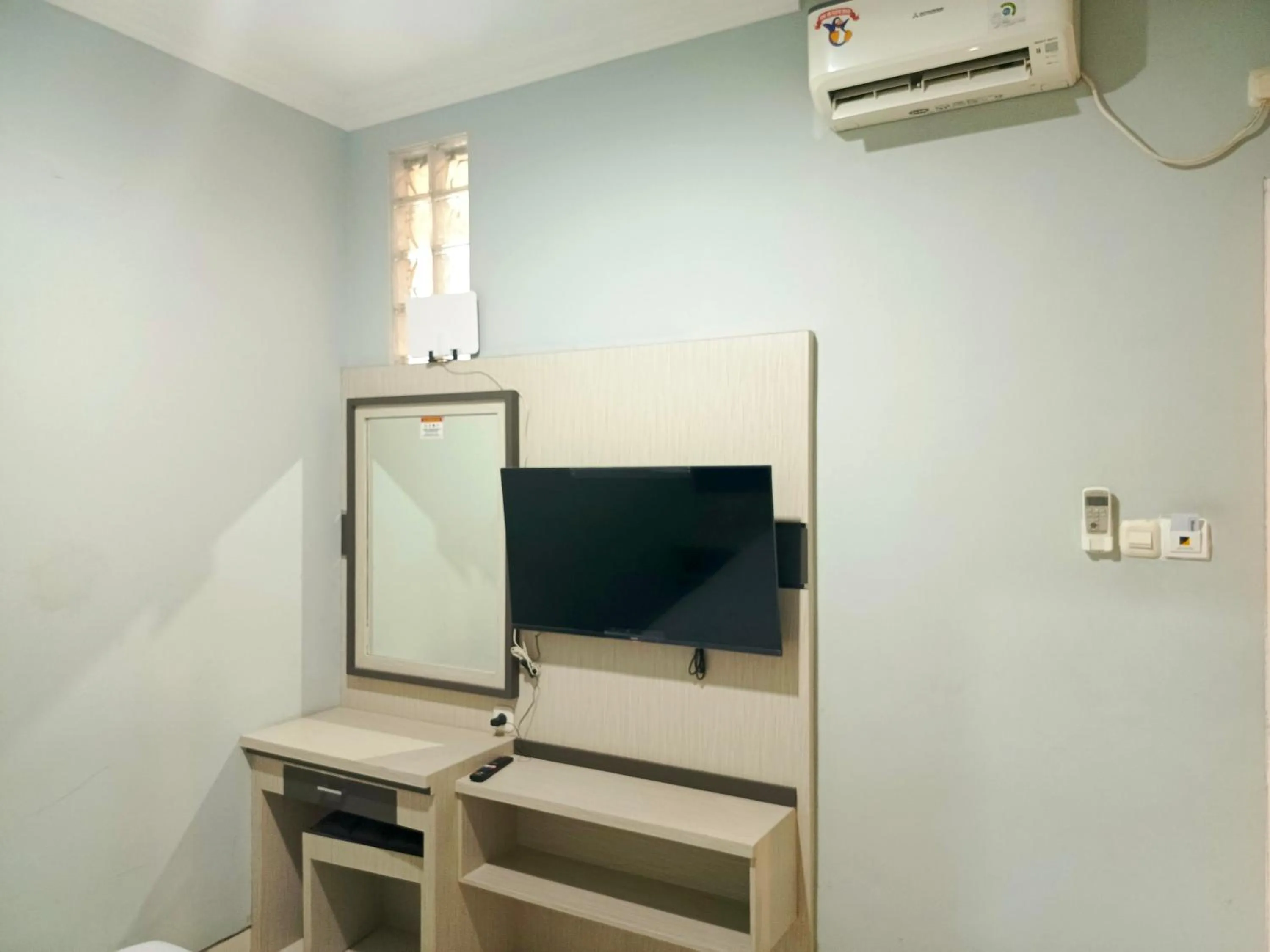 Bedroom in Kyrie Hotel