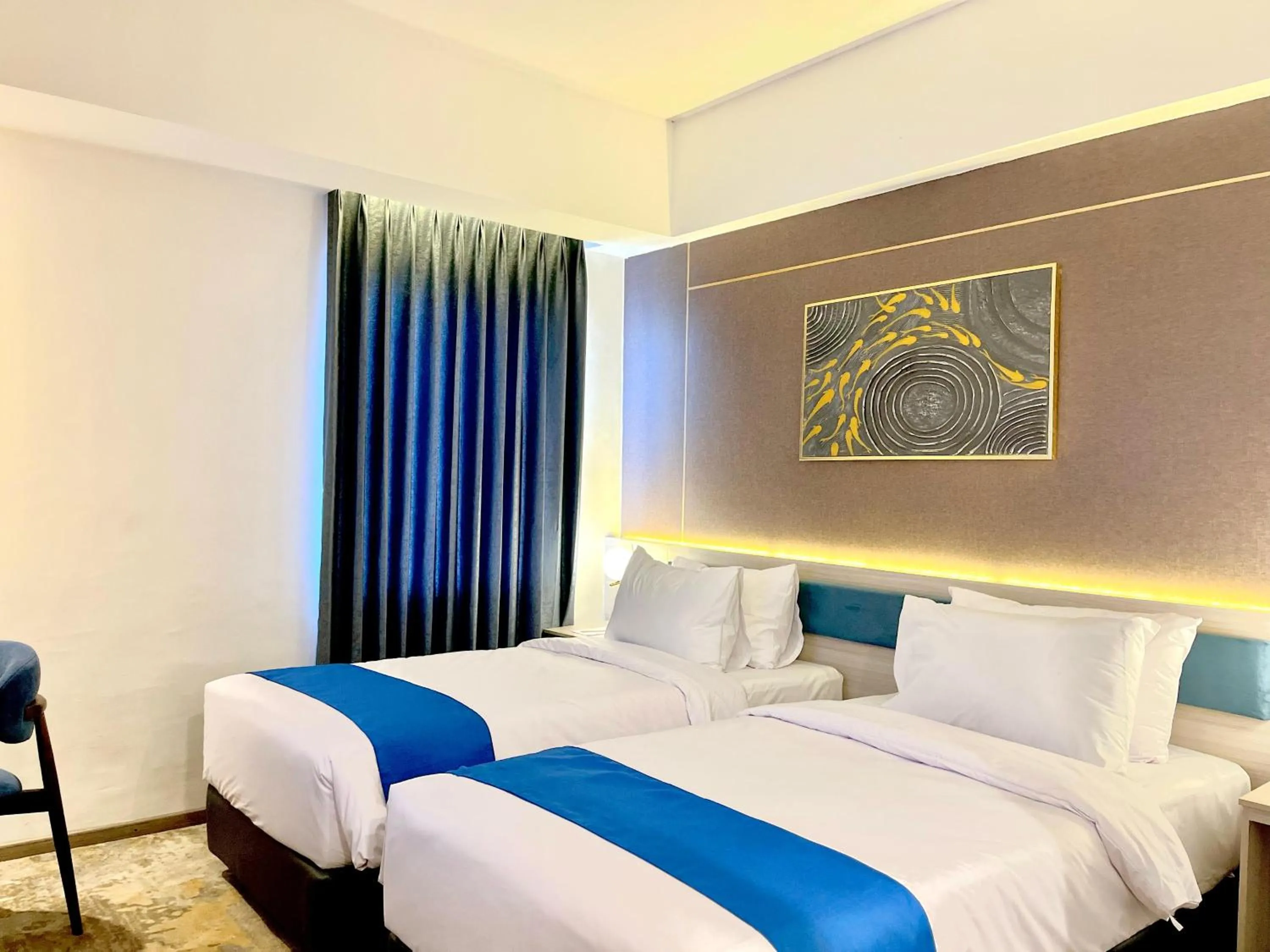 Bed in LYNN Hotel Tuban
