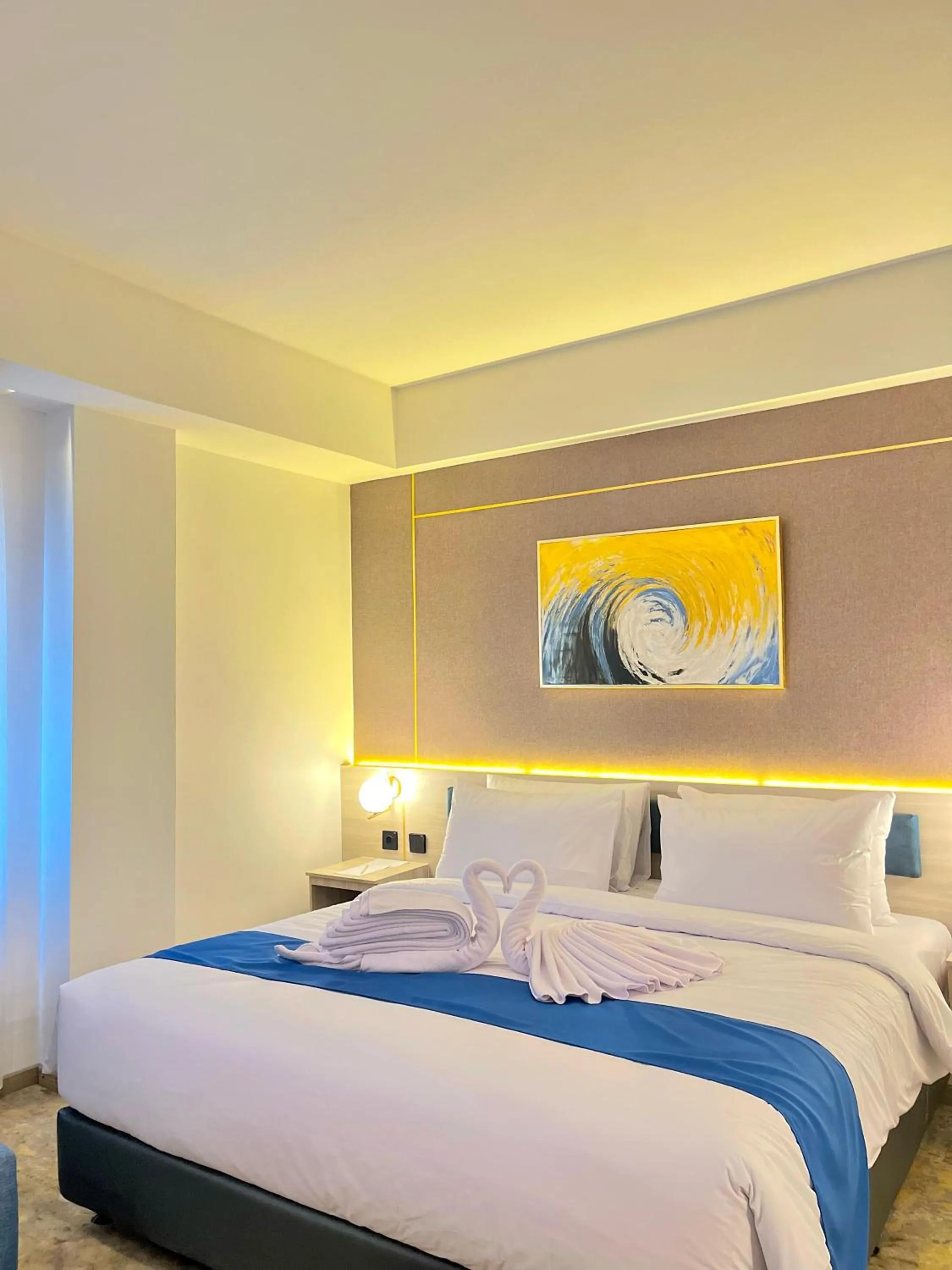 Bed in LYNN Hotel Tuban