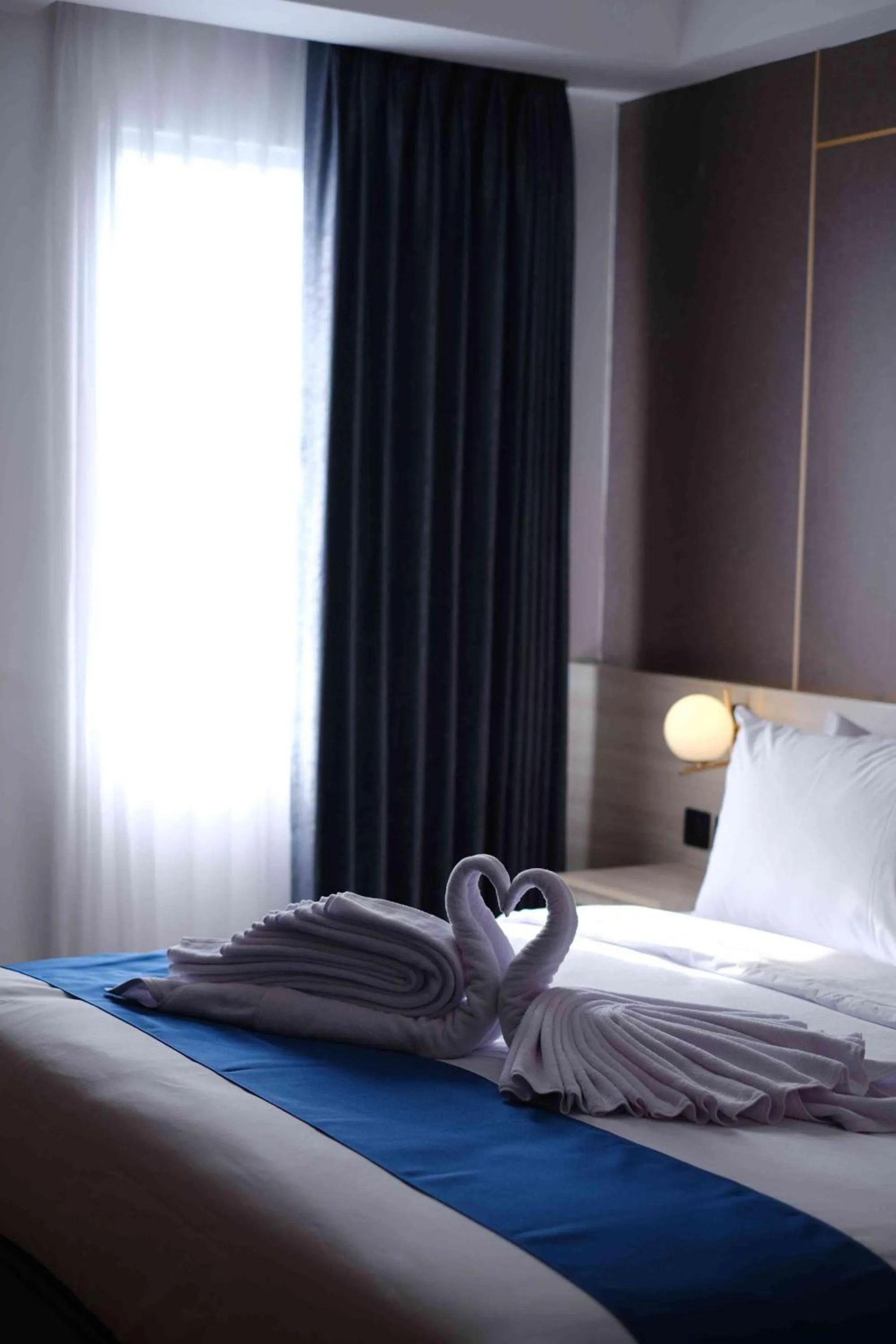 Bed in LYNN Hotel Tuban