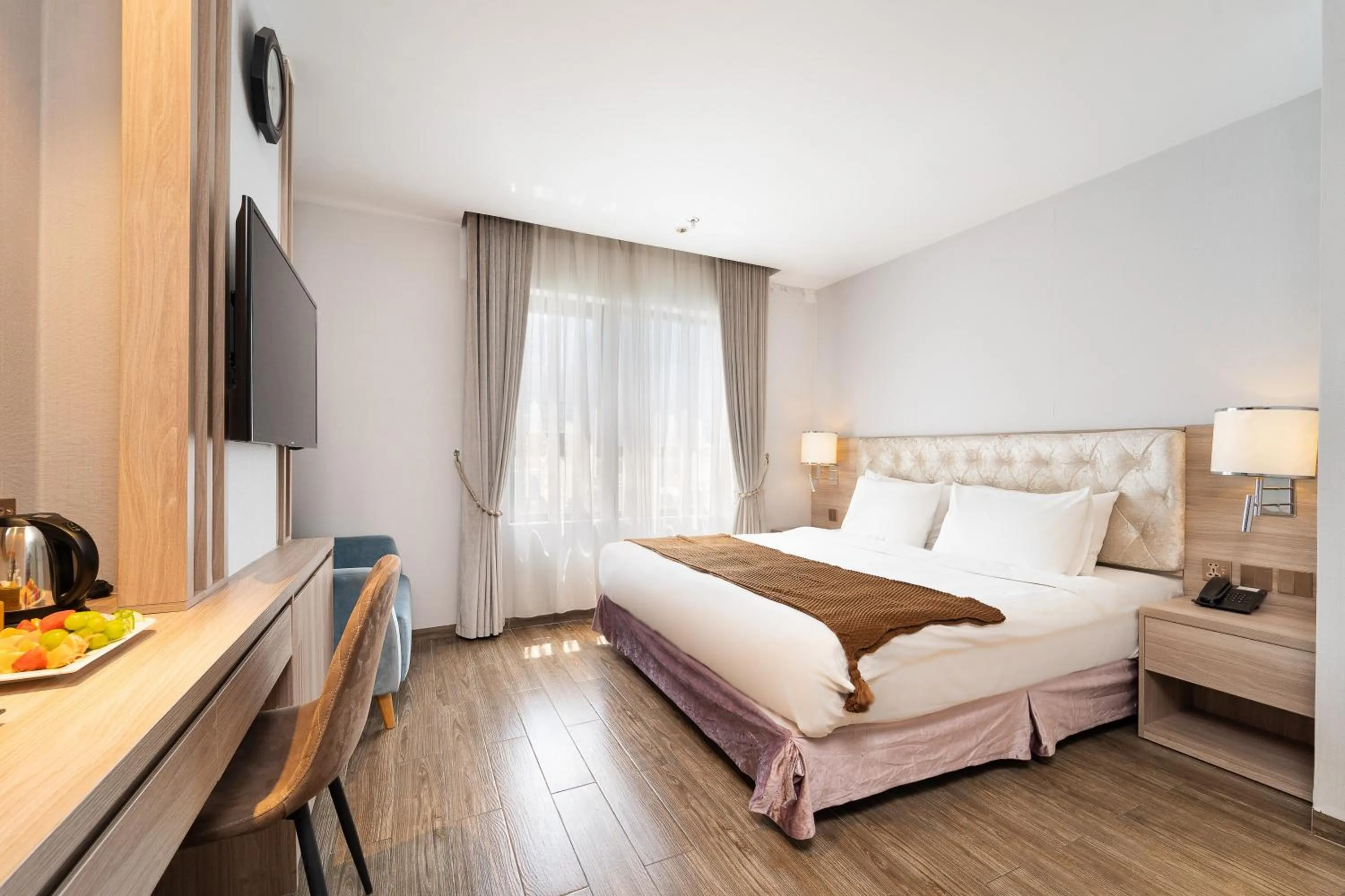 Bed in Nicecy Hotel Suites & Spa