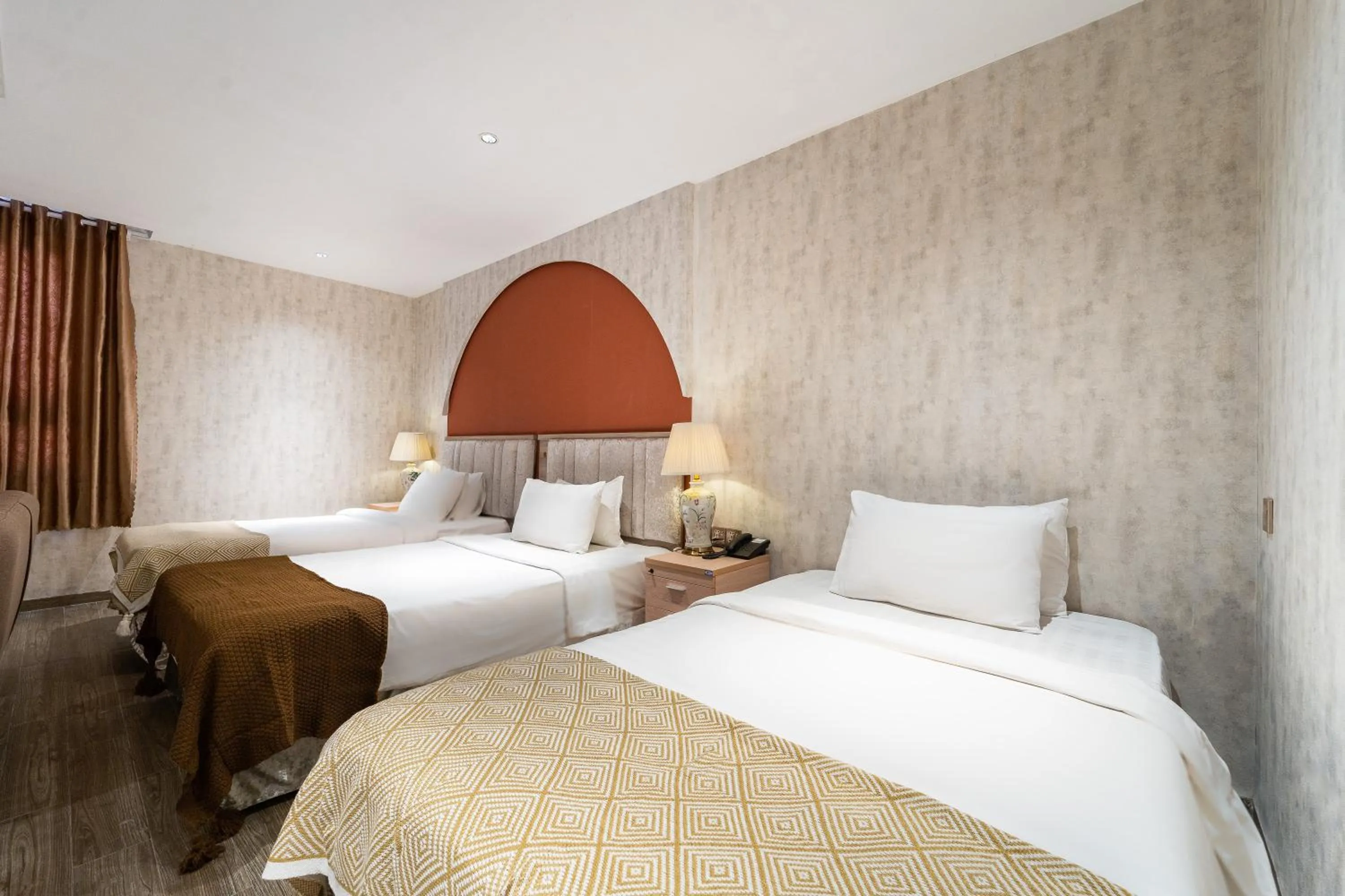 Bed in Nicecy Hotel Suites & Spa