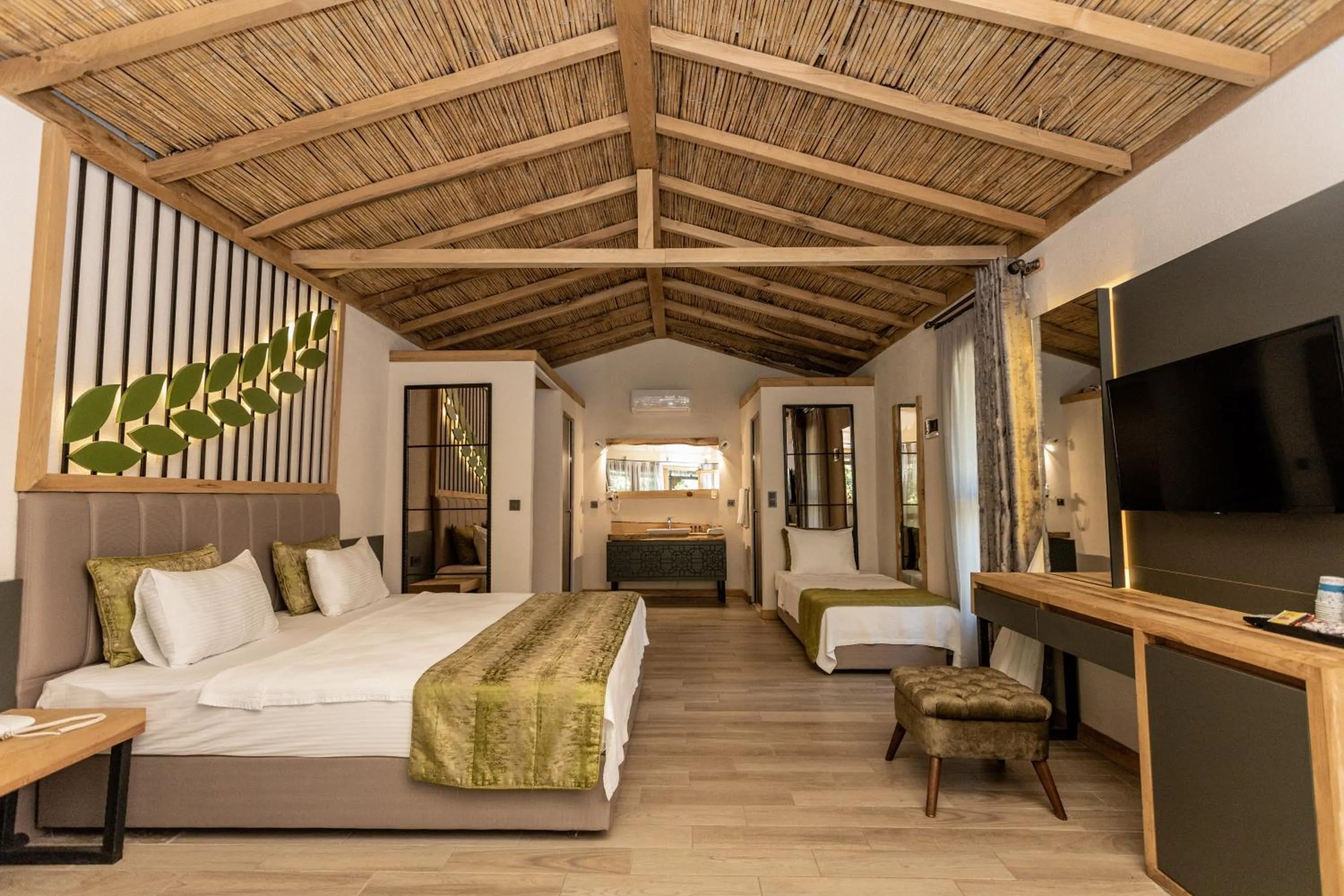 Communal lounge/ TV room, Bed in Gizli Cennet Villages Hotel