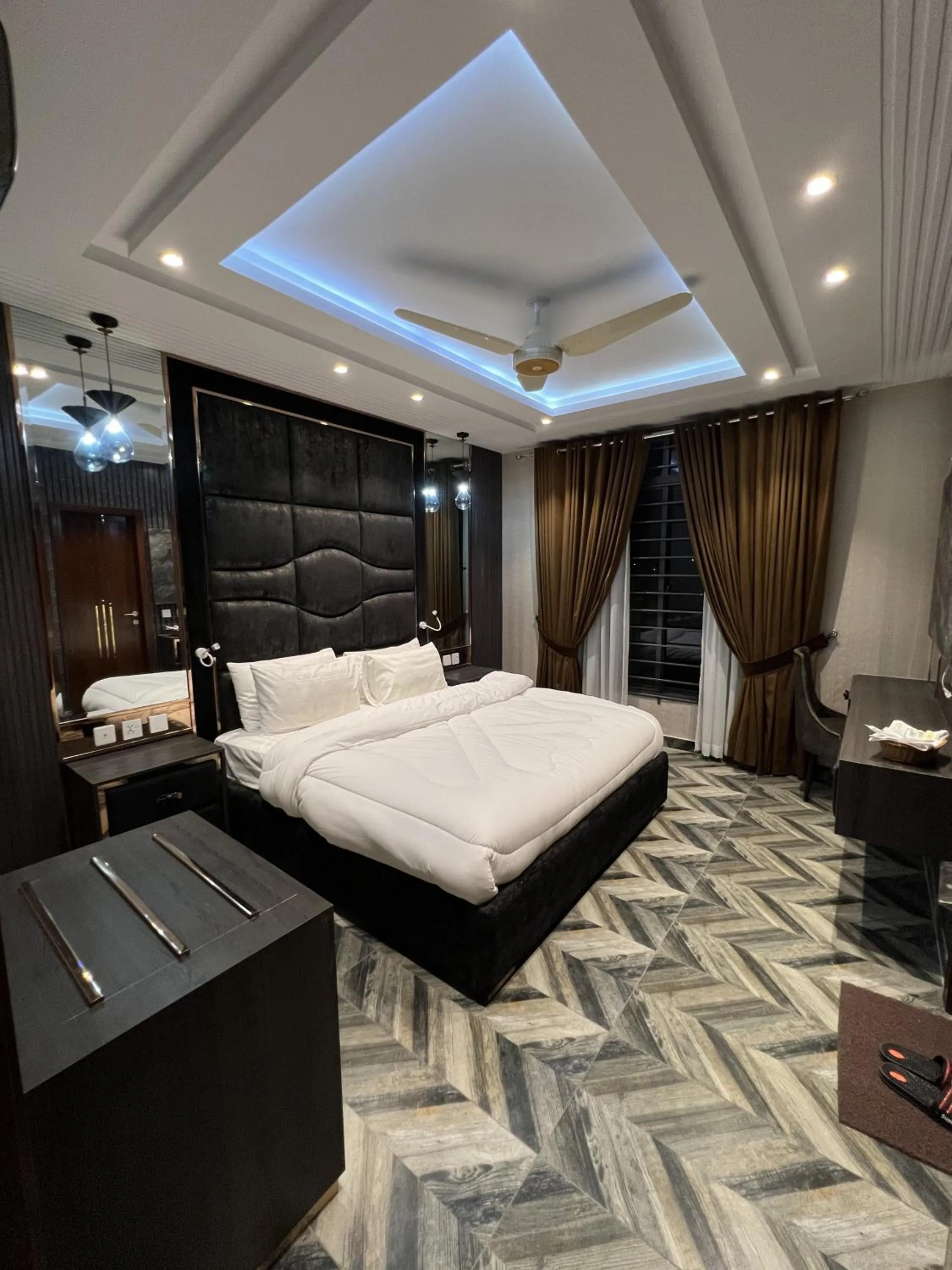 Bed in Courteous Hotel