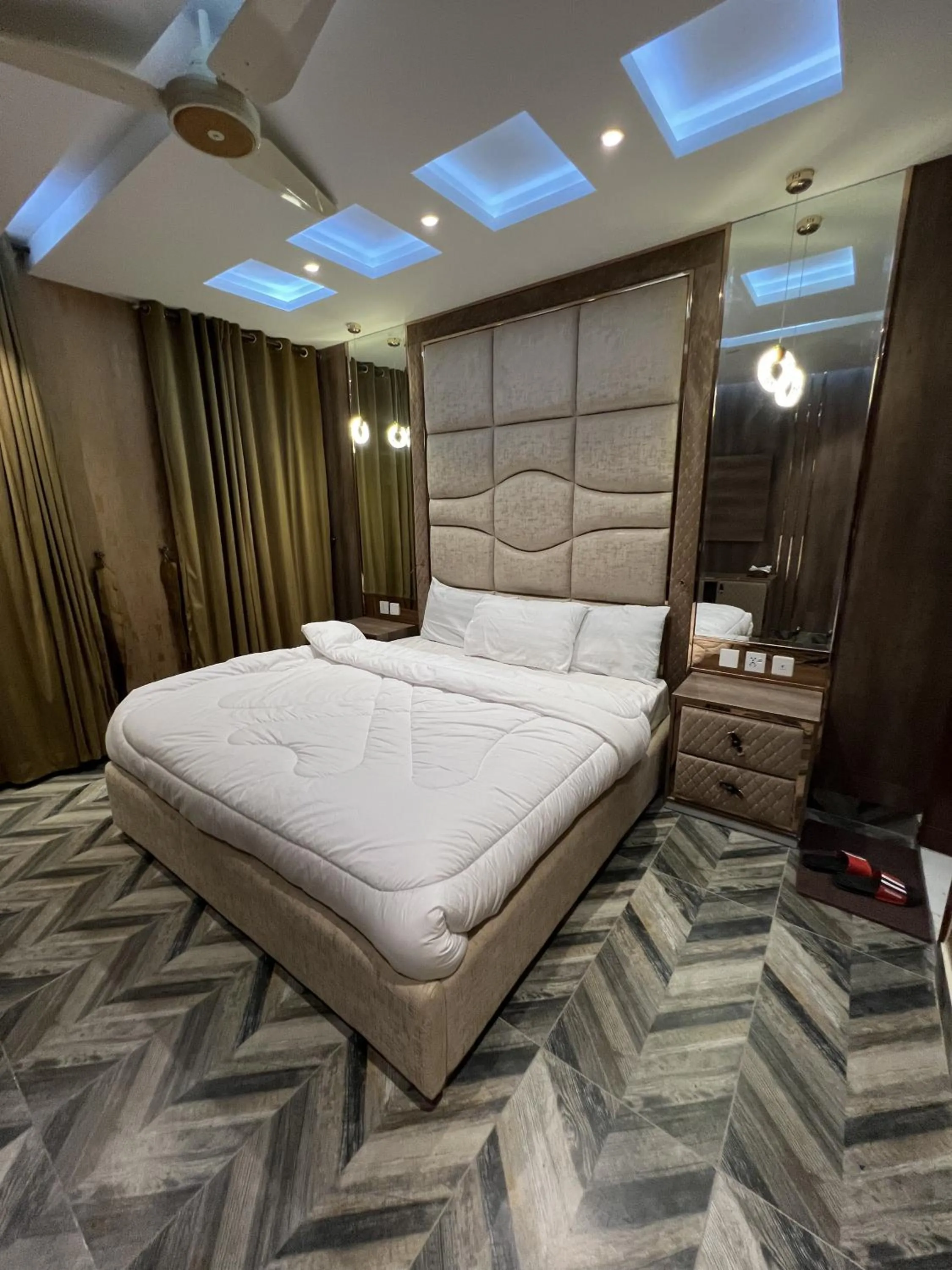 Bed in Courteous Hotel