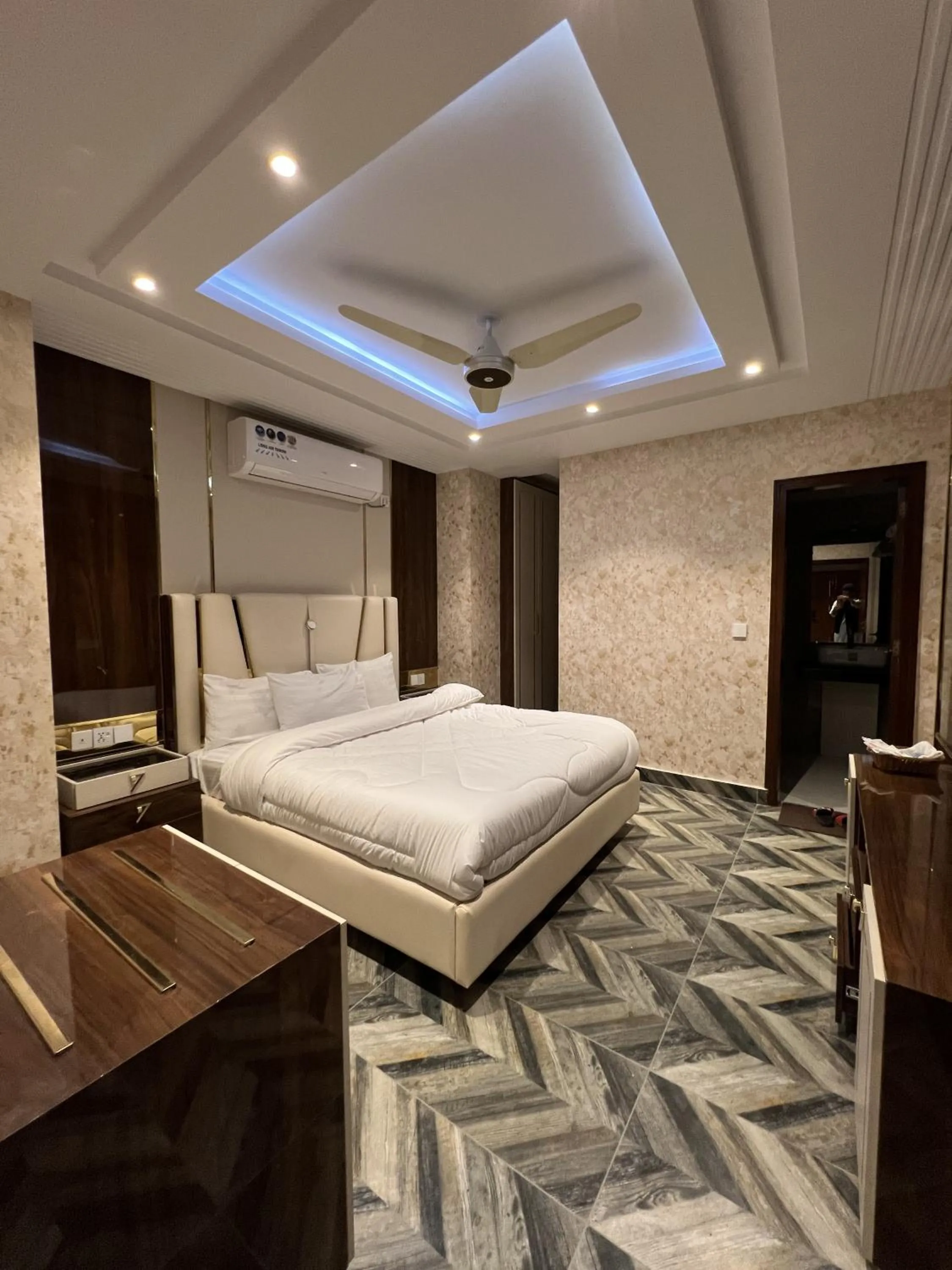 Bed in Courteous Hotel