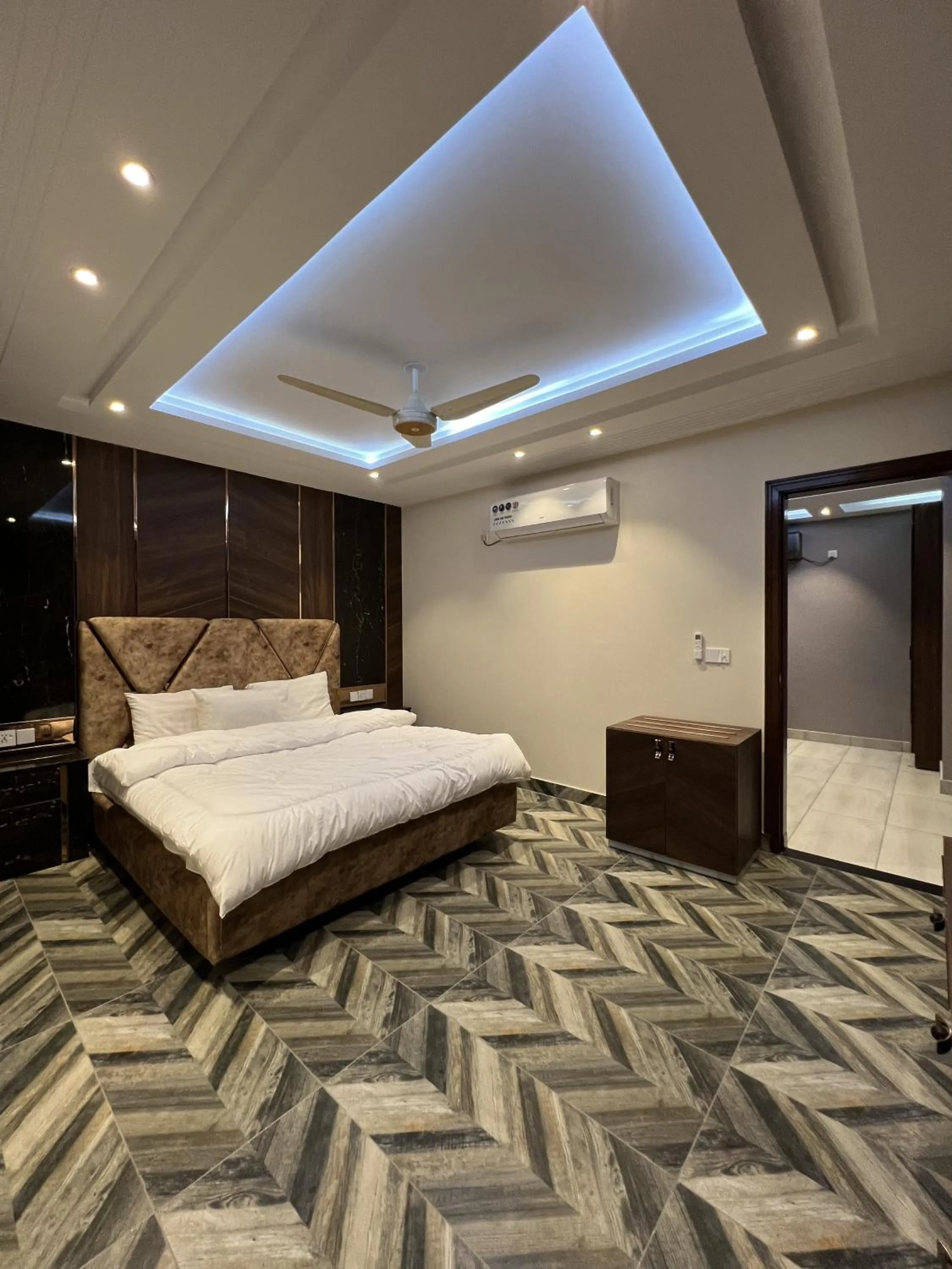 Bed in Courteous Hotel