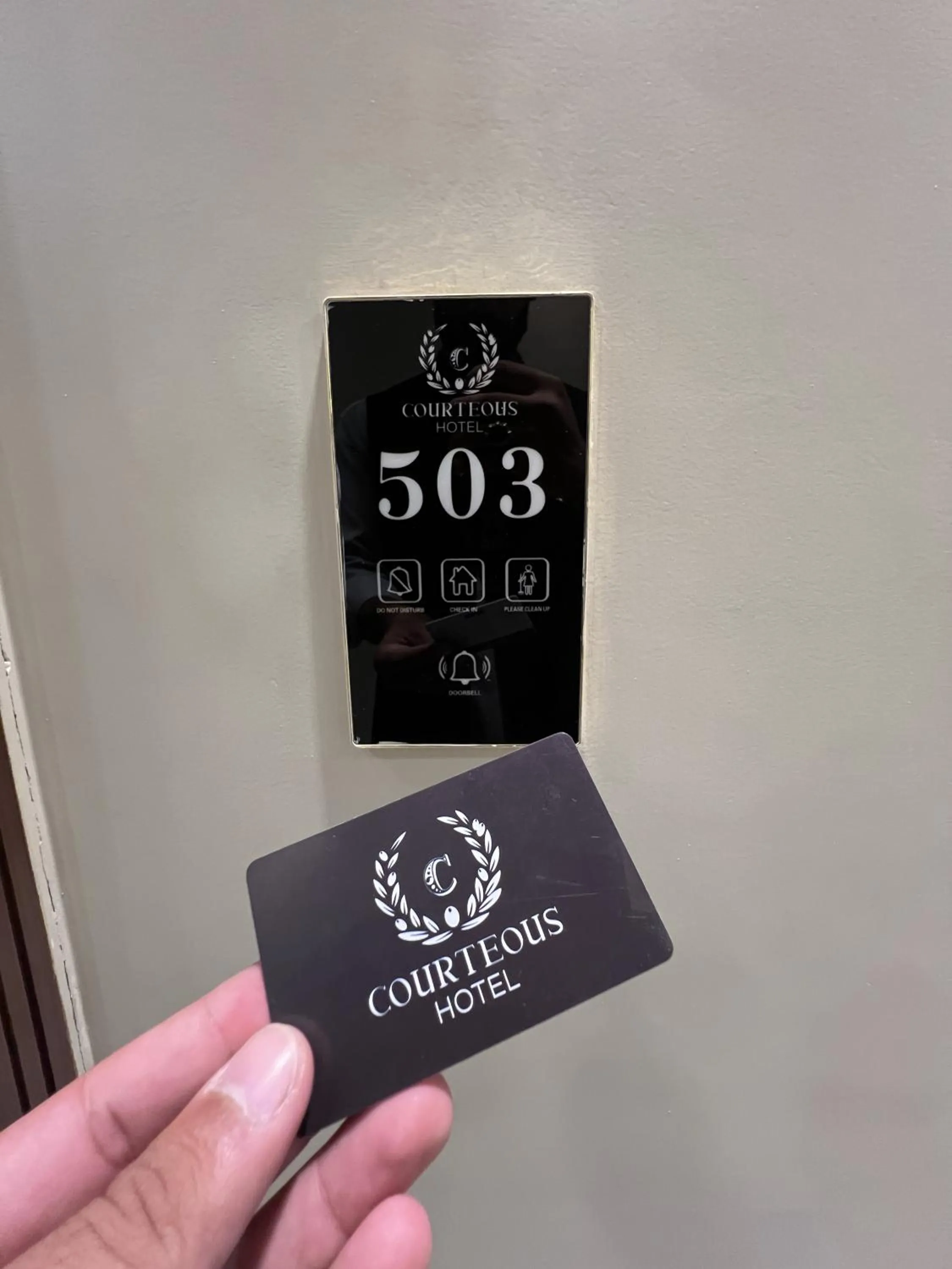 Property logo or sign in Courteous Hotel