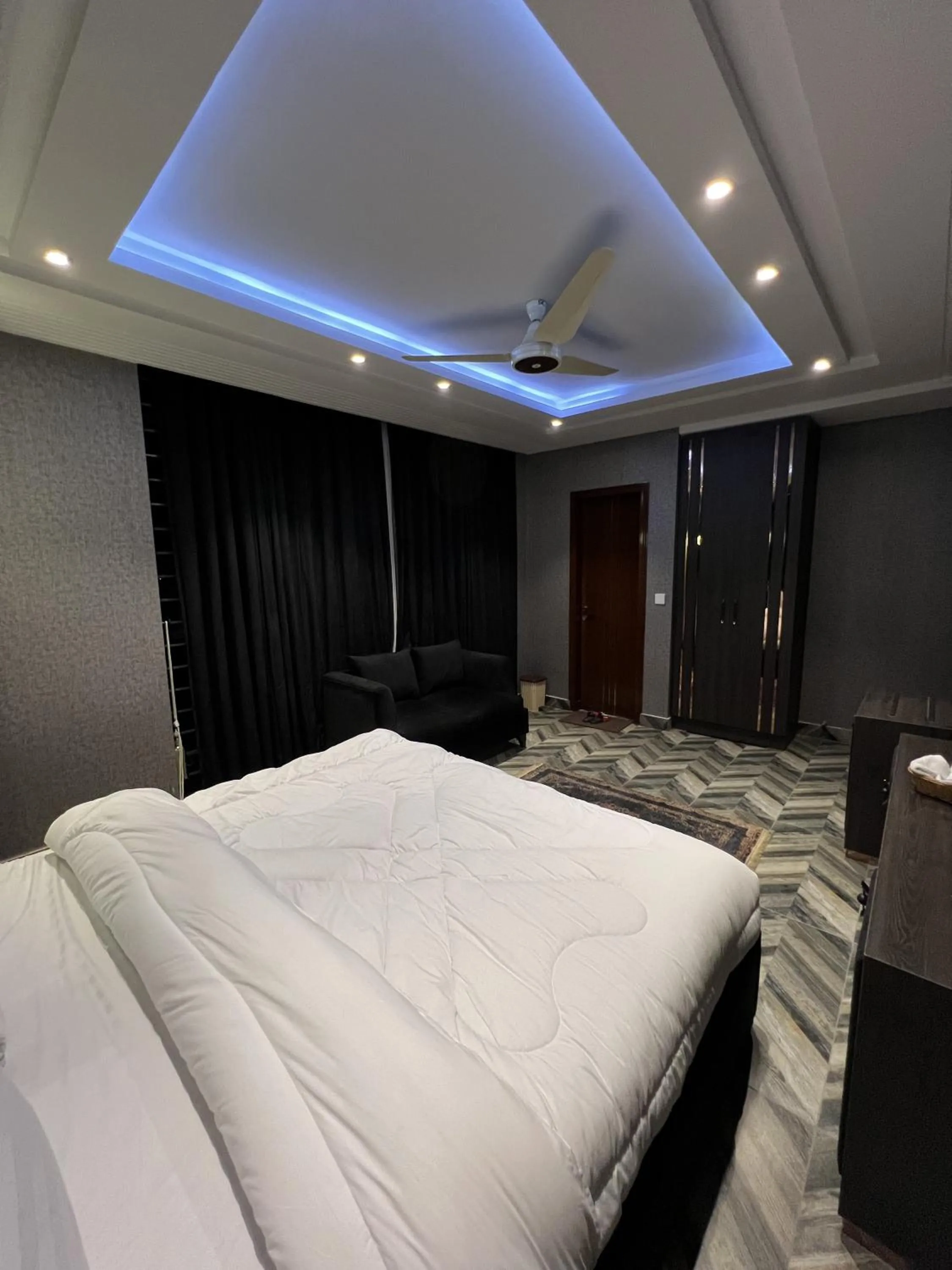 Bed in Courteous Hotel