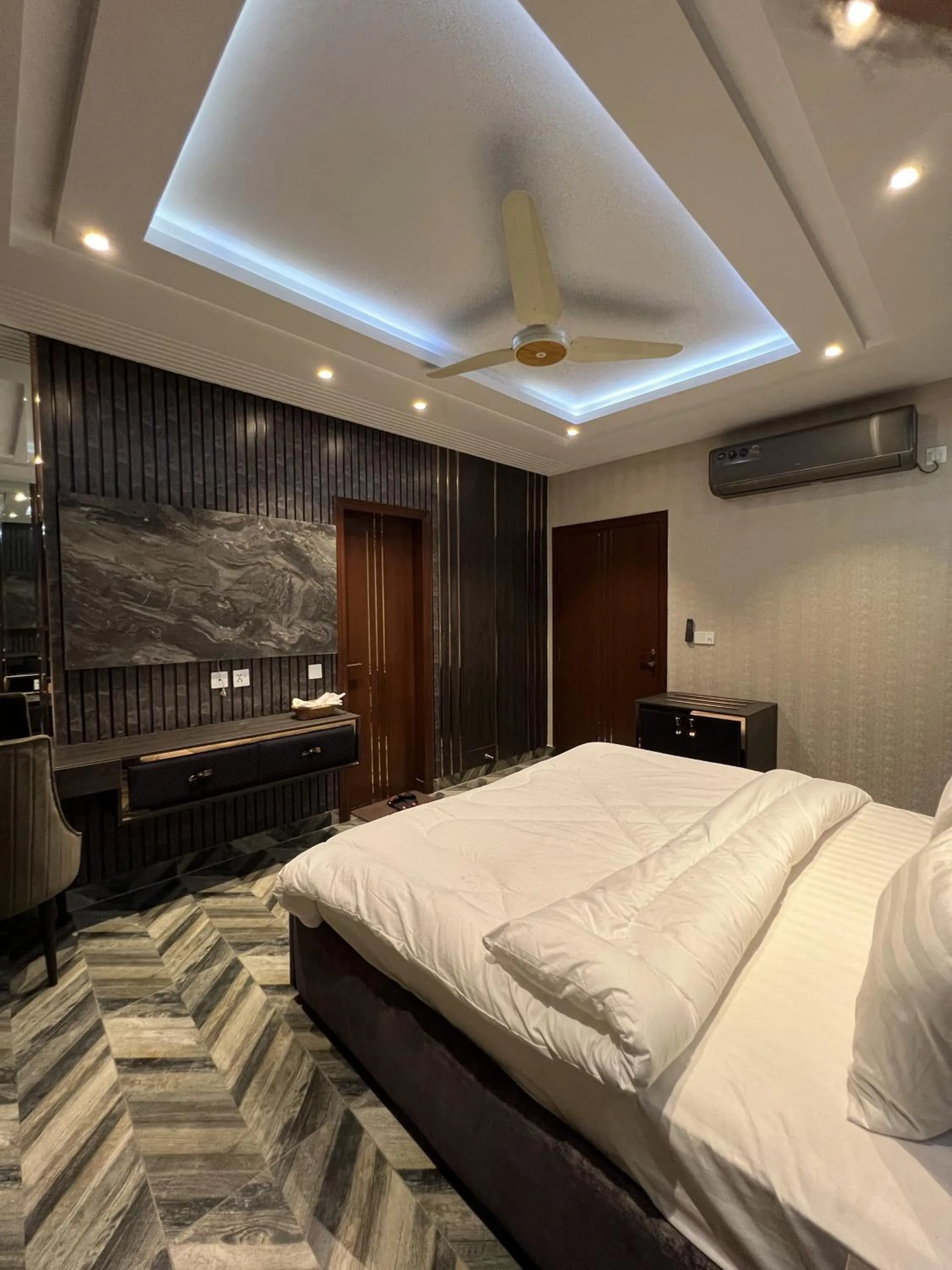 Bed in Courteous Hotel