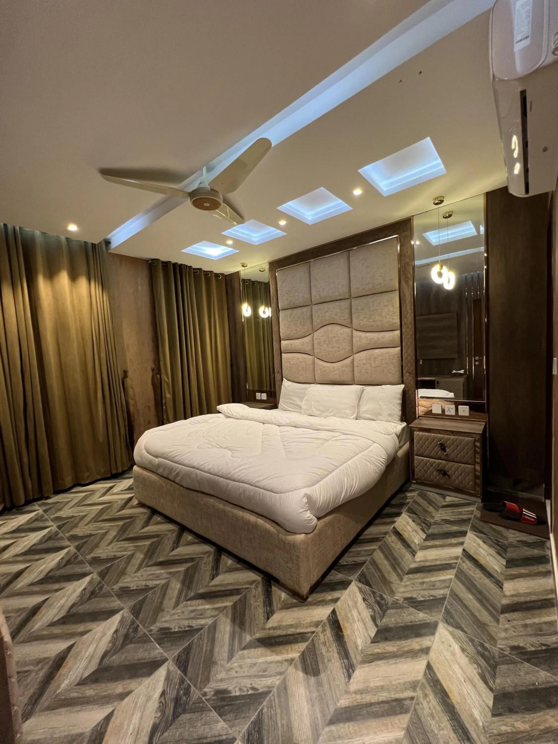 Bed in Courteous Hotel