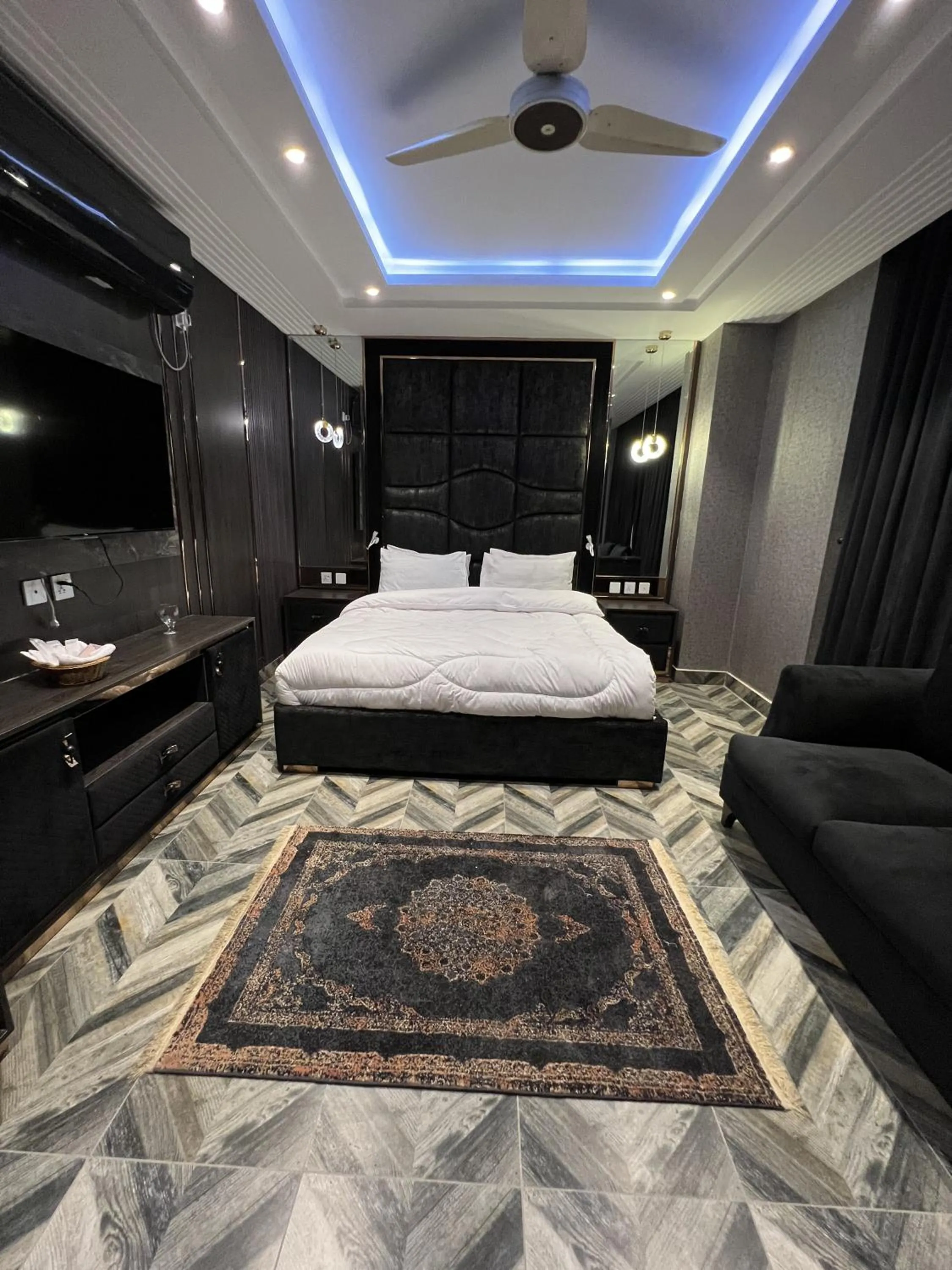 Bed in Courteous Hotel
