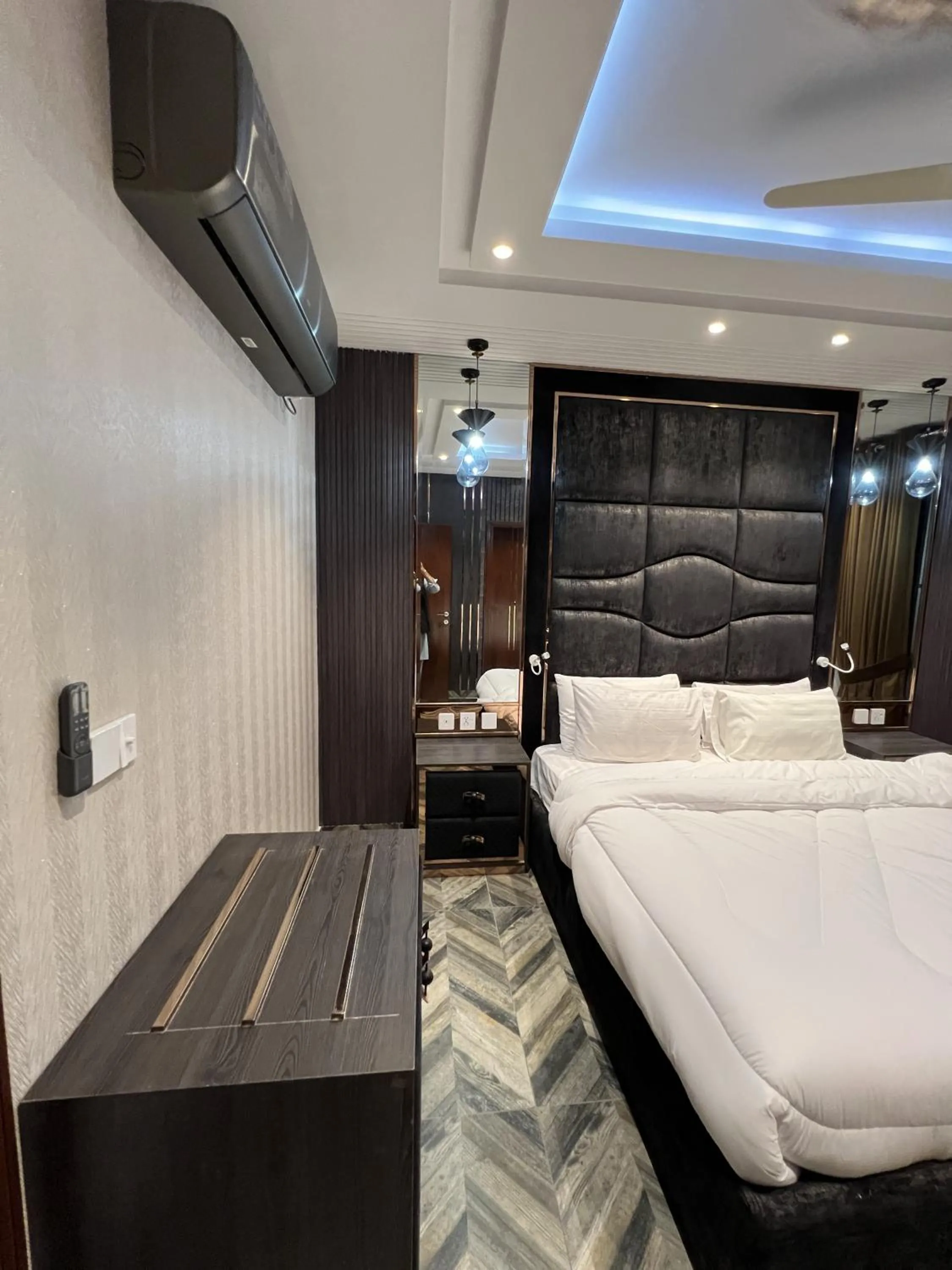 Bed in Courteous Hotel