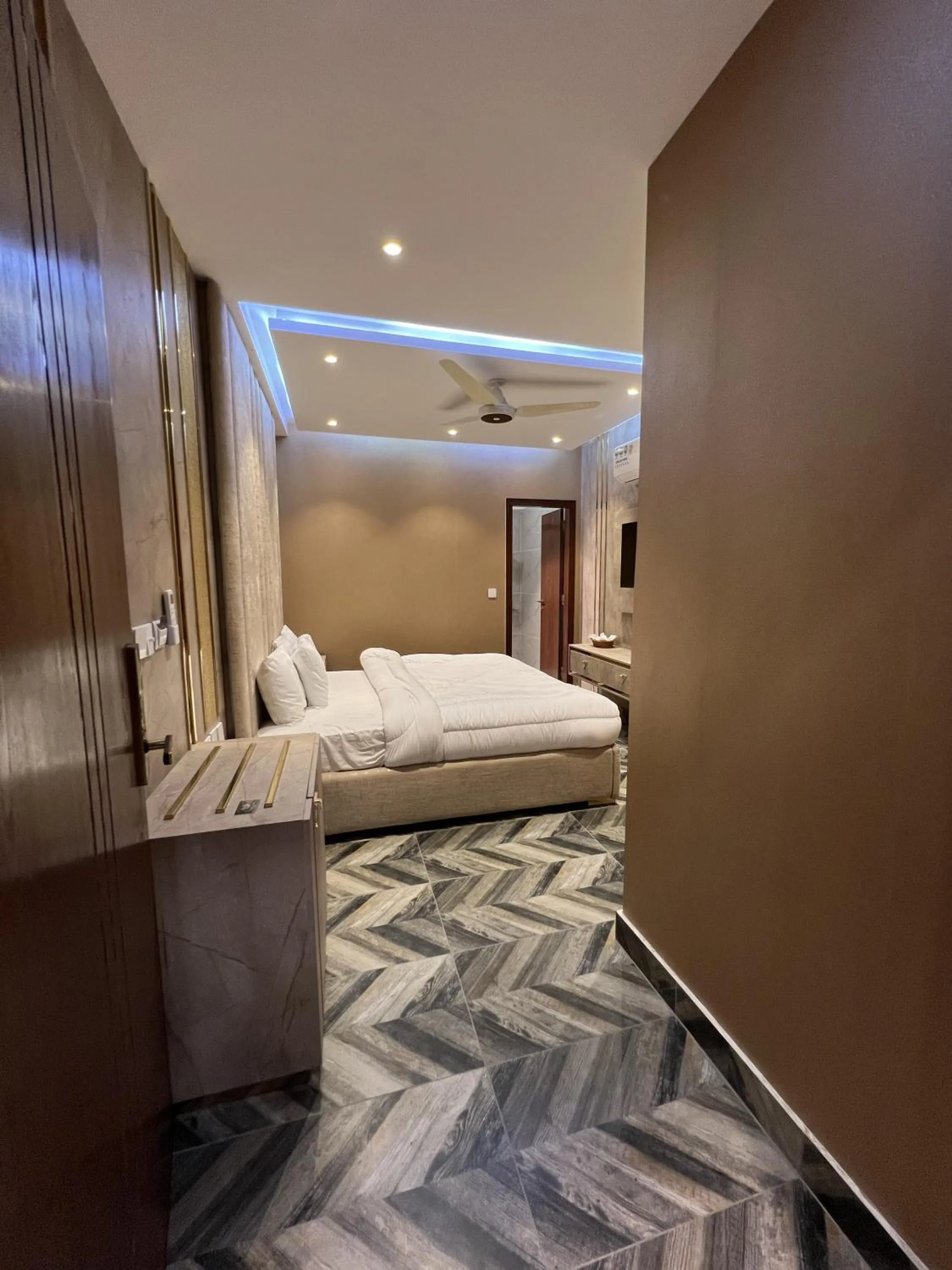 Bed in Courteous Hotel