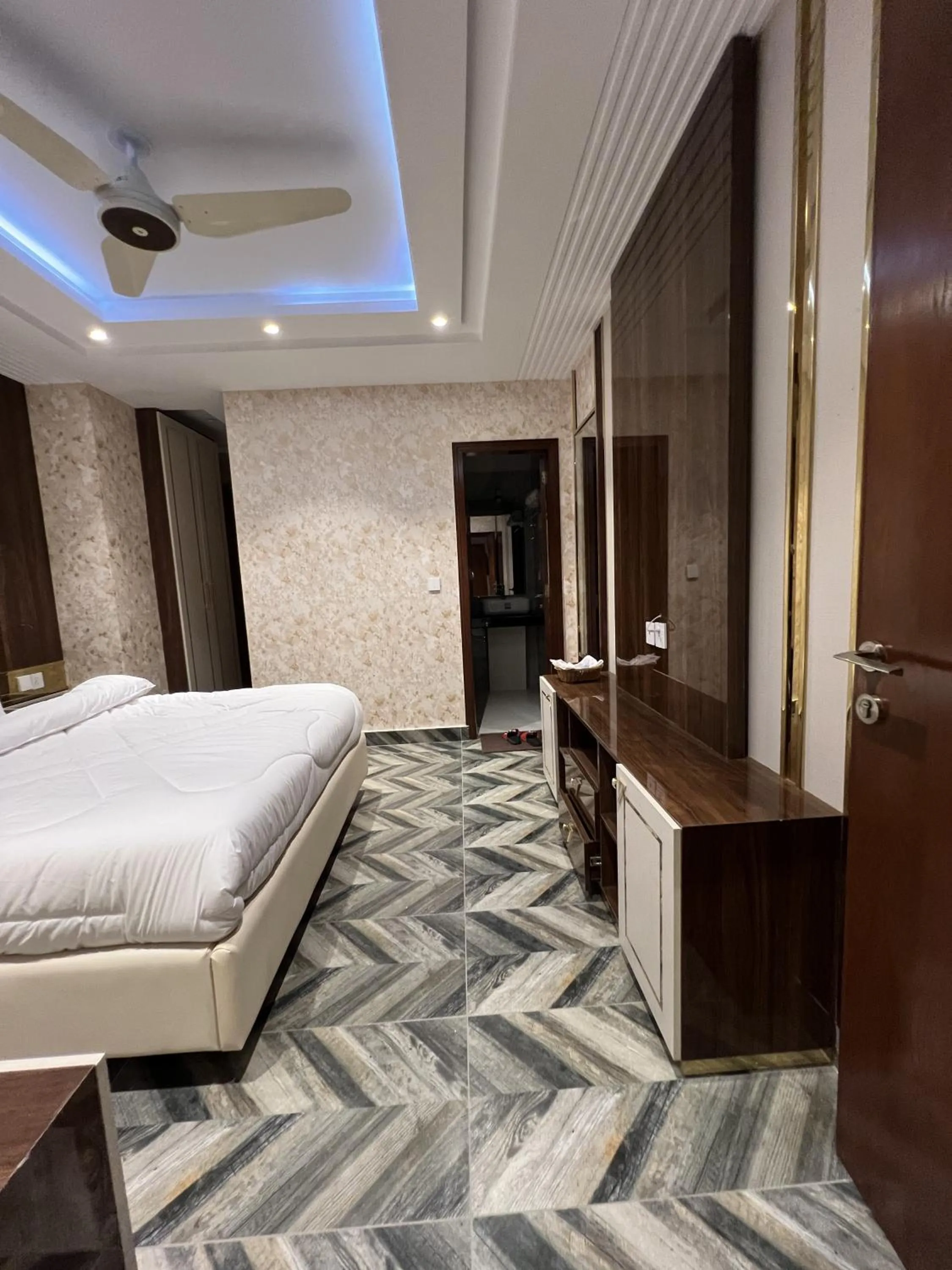 Bed in Courteous Hotel
