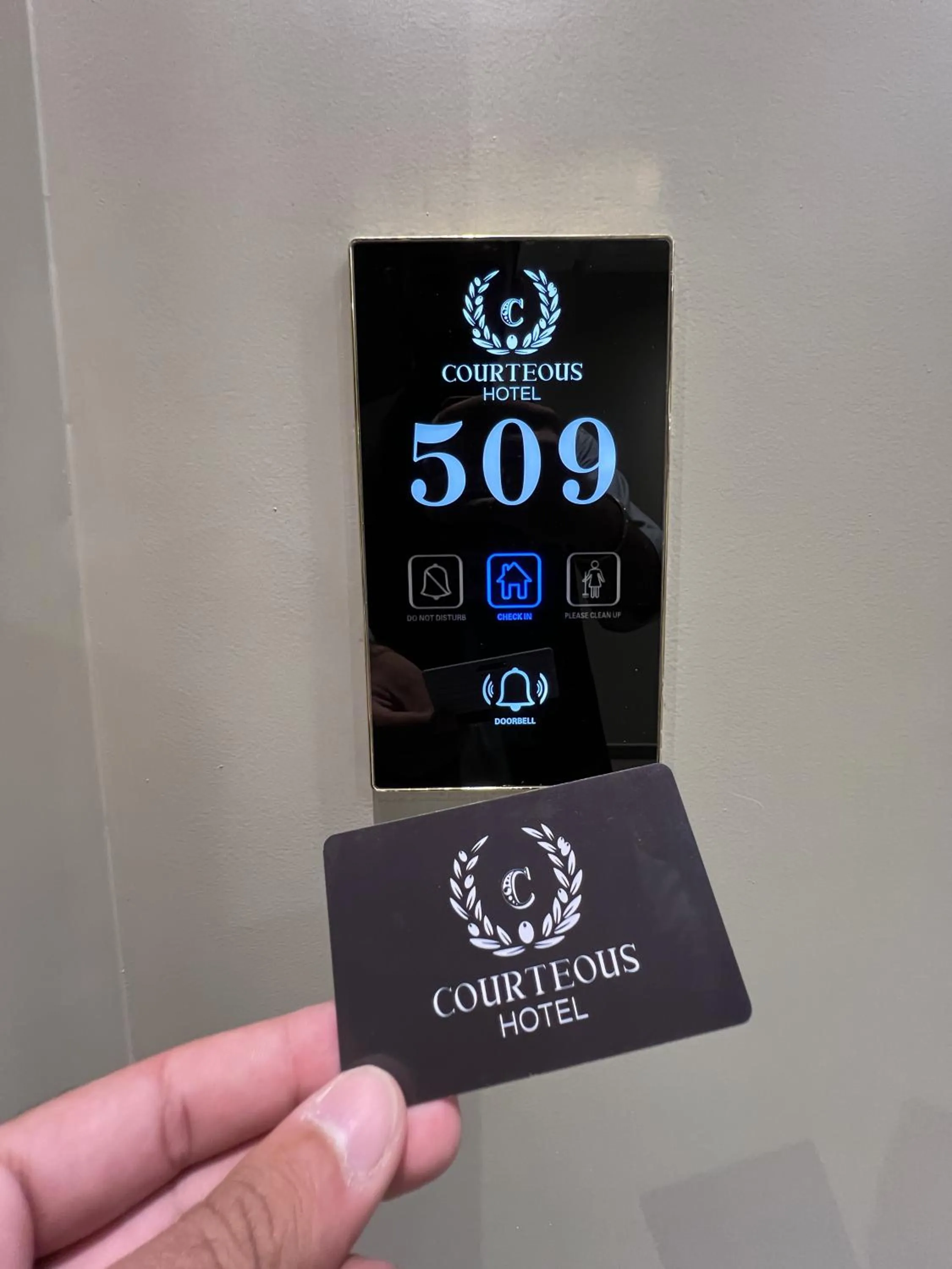Property logo or sign in Courteous Hotel