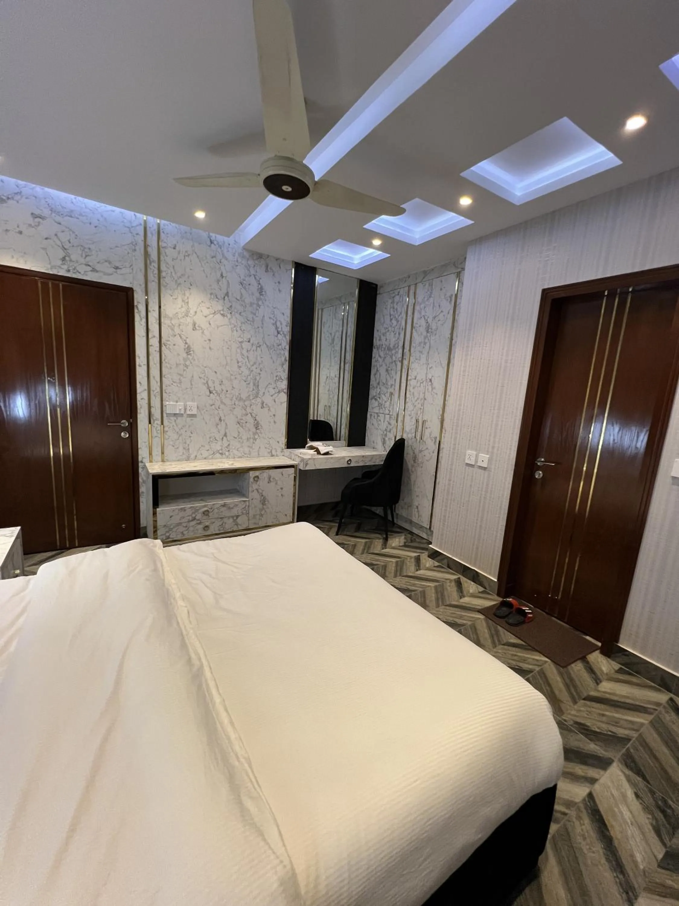 Bed in Courteous Hotel
