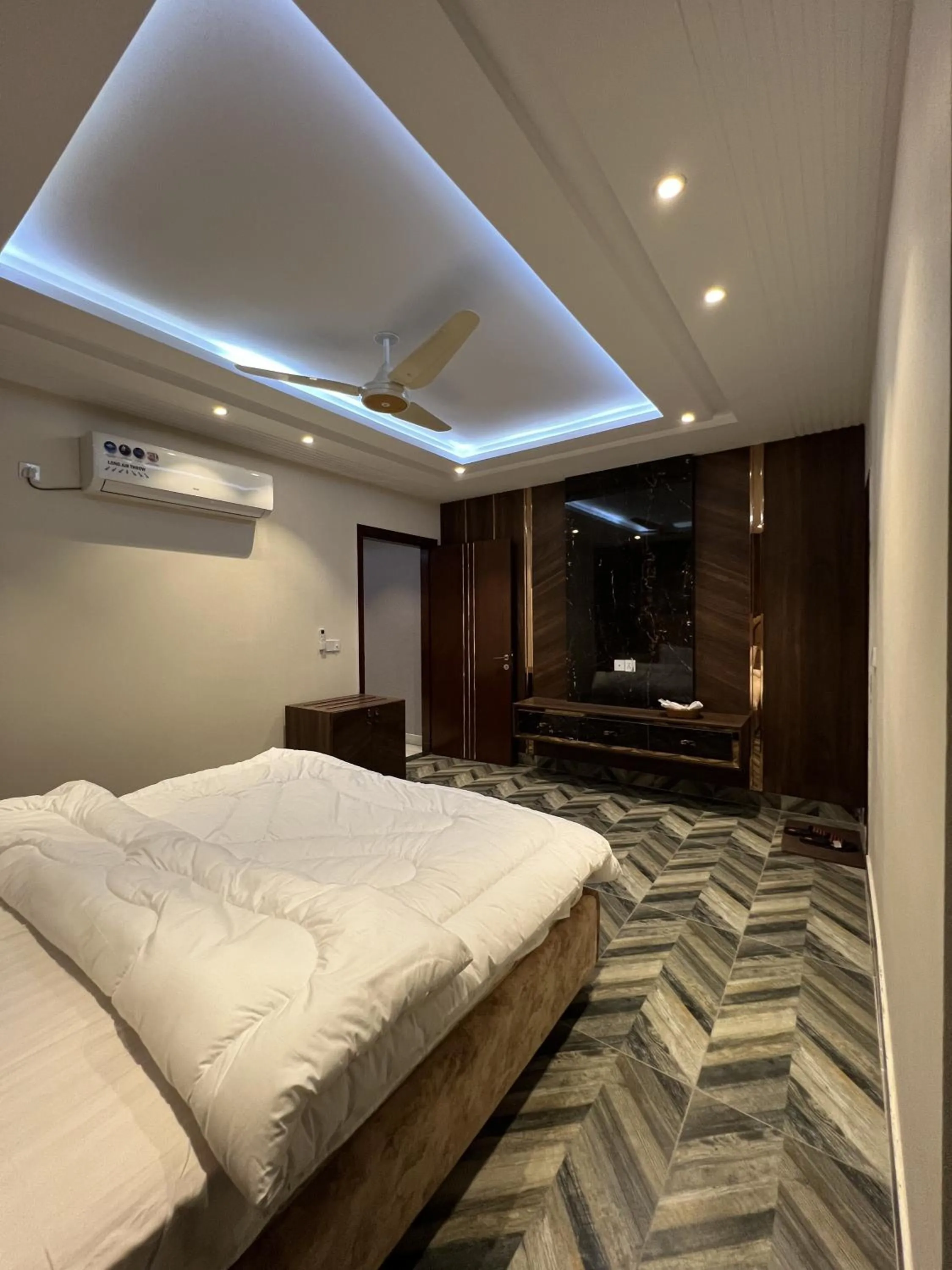 Bed in Courteous Hotel