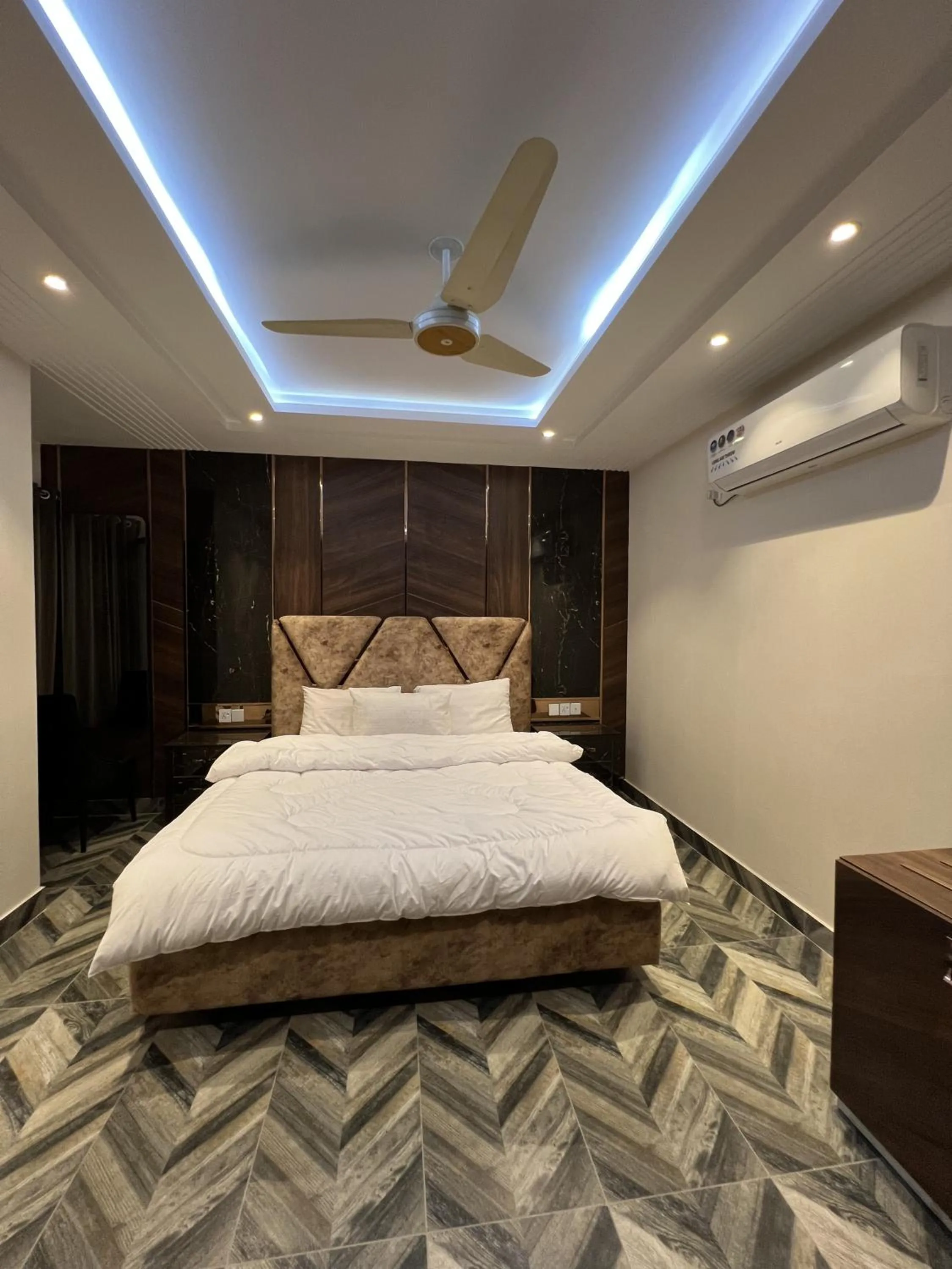 Bed in Courteous Hotel