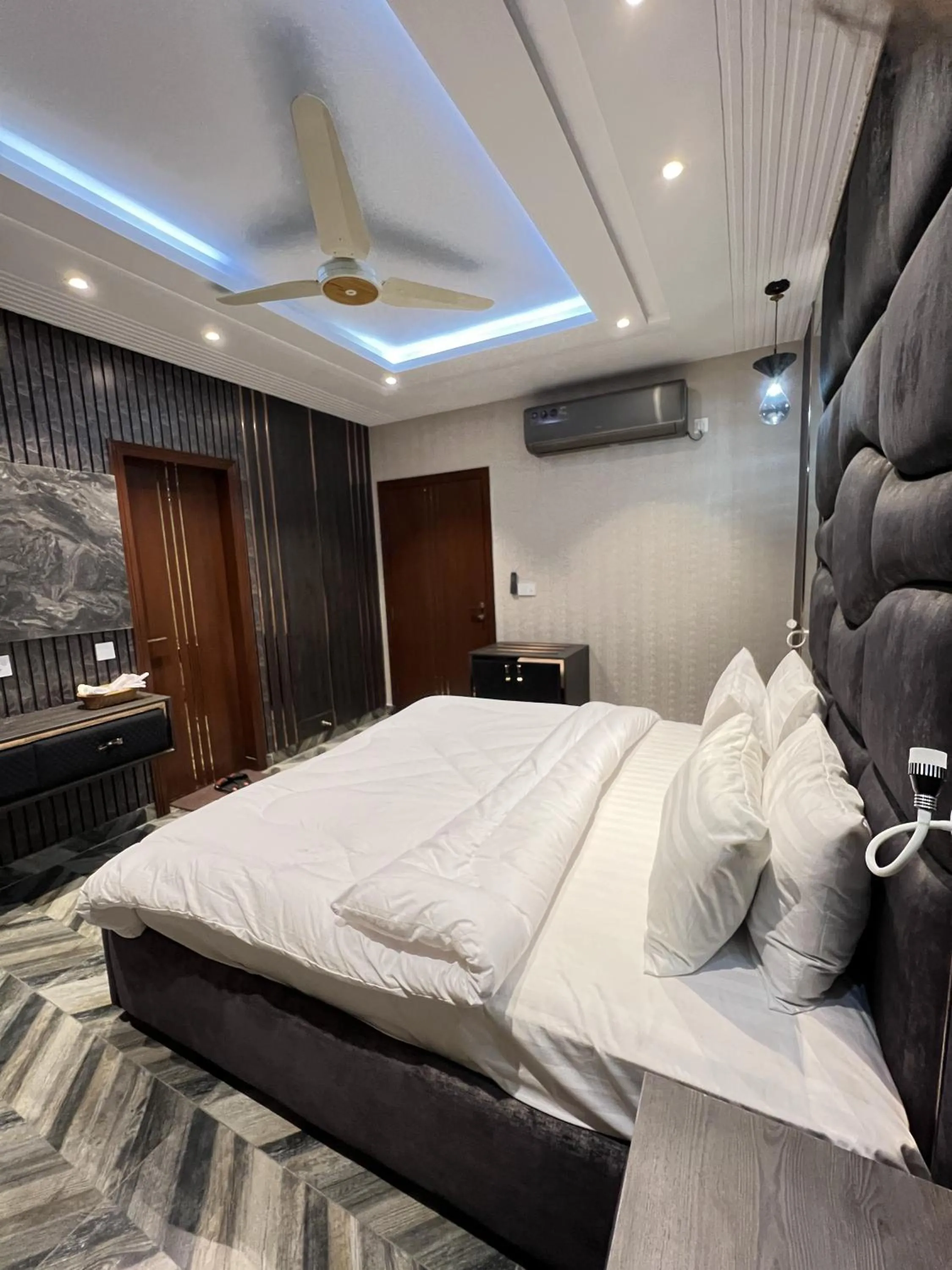 Bed in Courteous Hotel