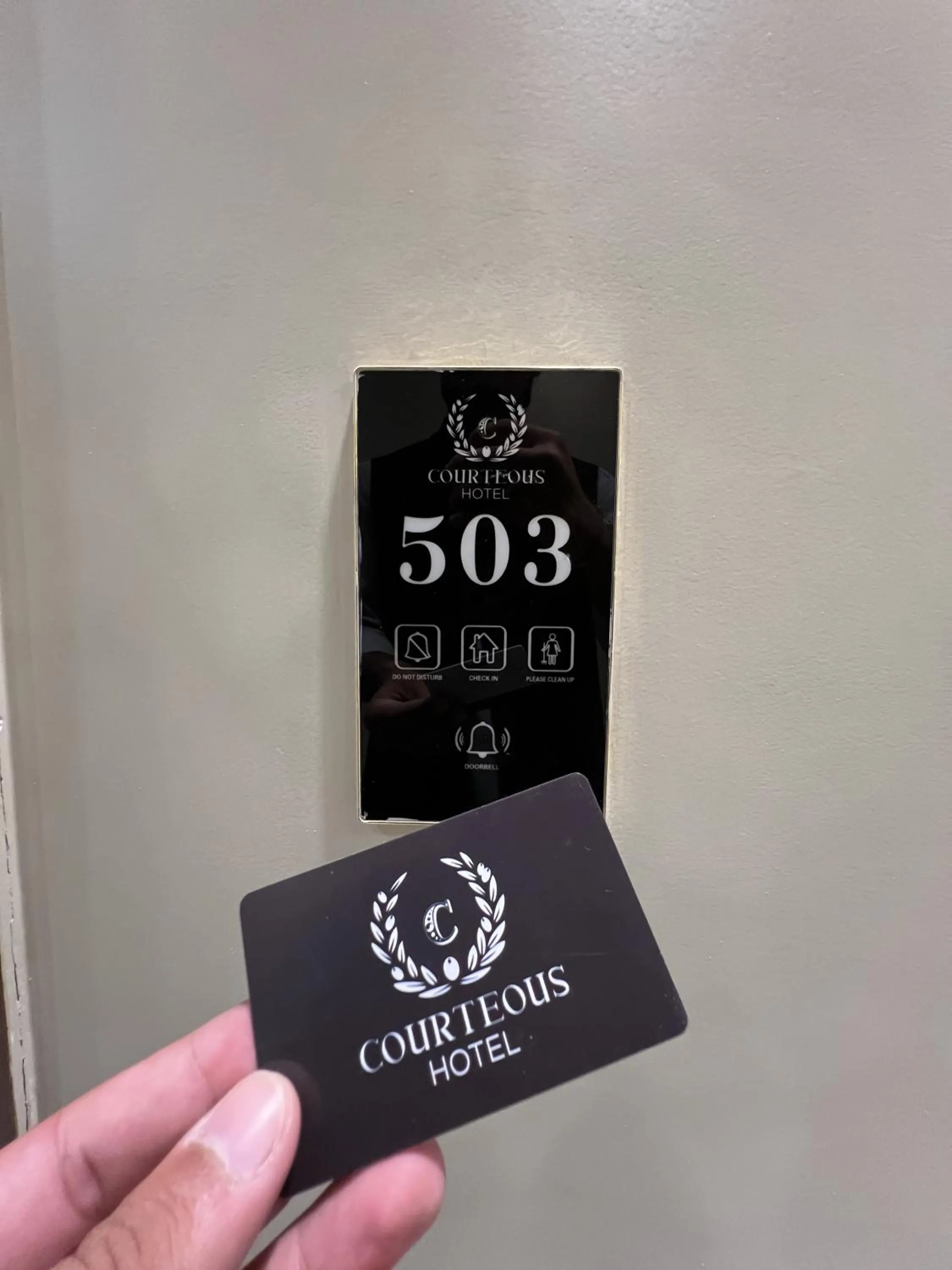 Property logo or sign in Courteous Hotel