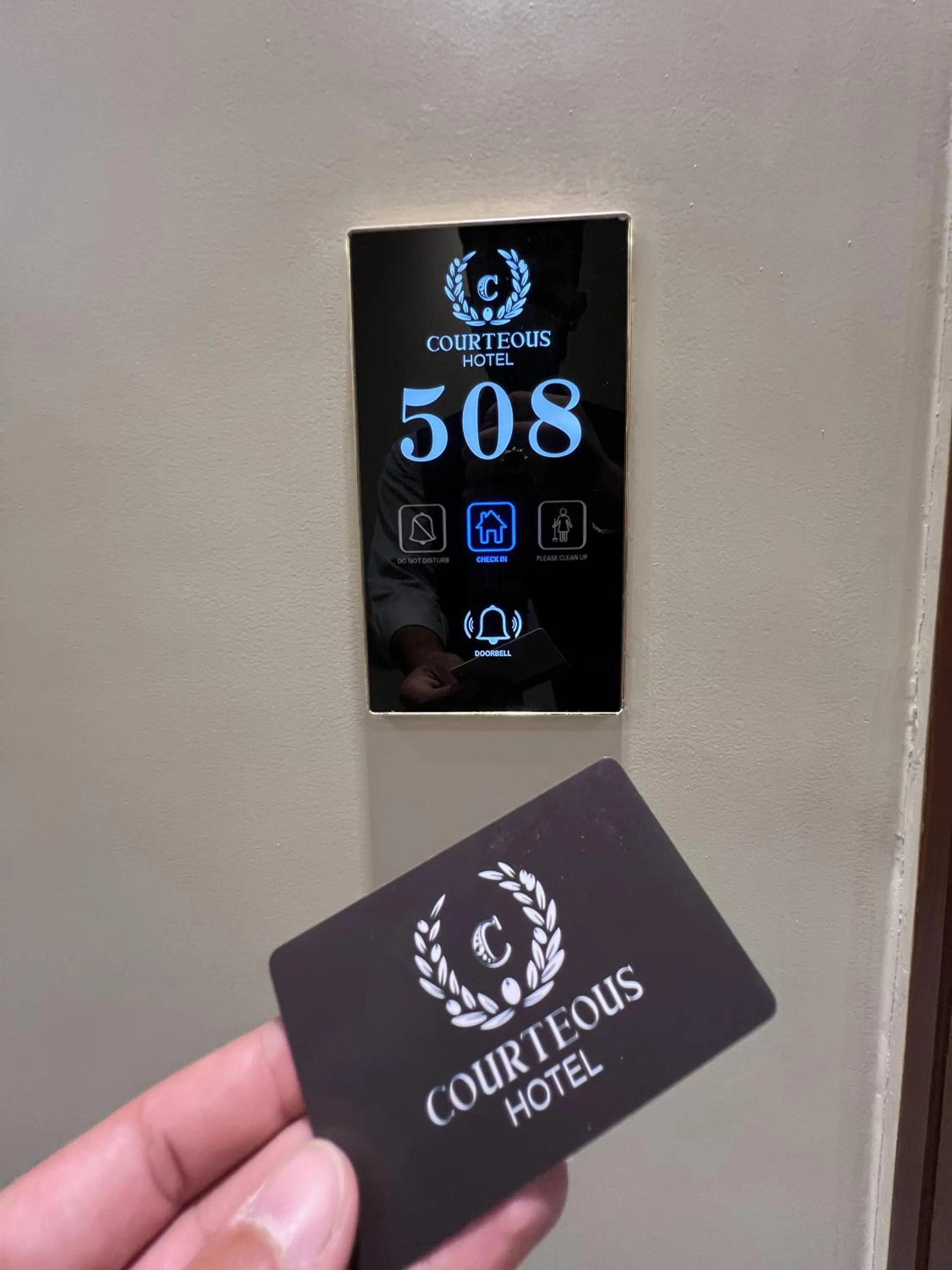 Property logo or sign in Courteous Hotel