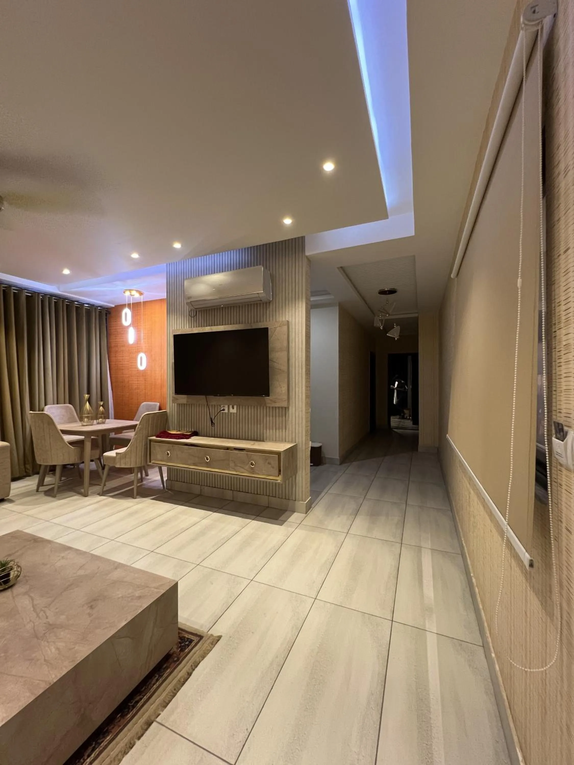 Communal lounge/ TV room in Courteous Hotel