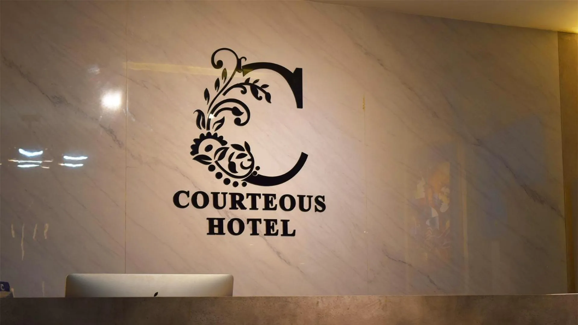 Property building in Courteous Hotel