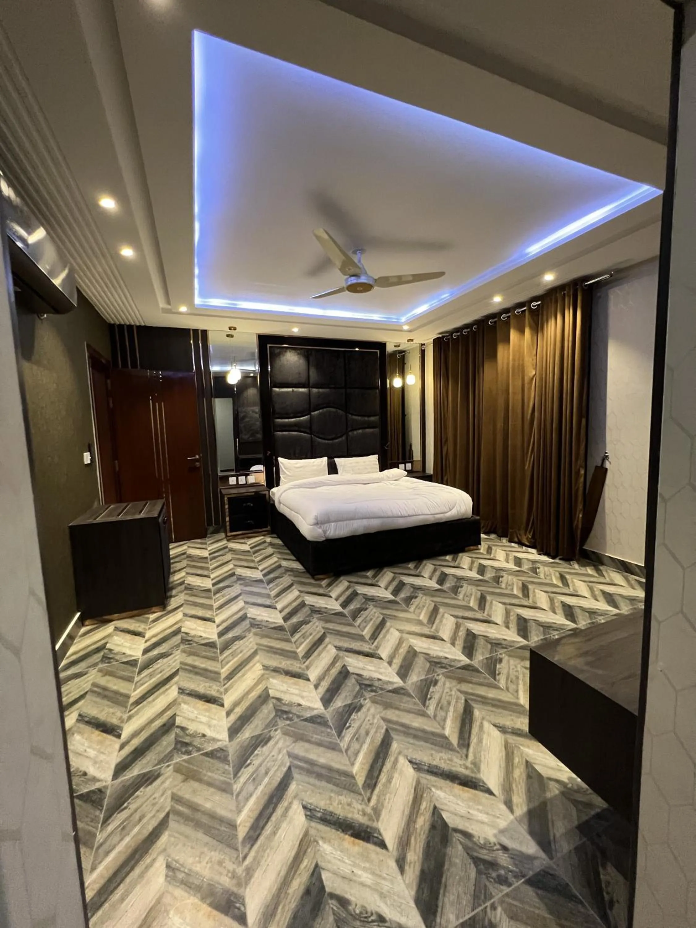 Bed in Courteous Hotel