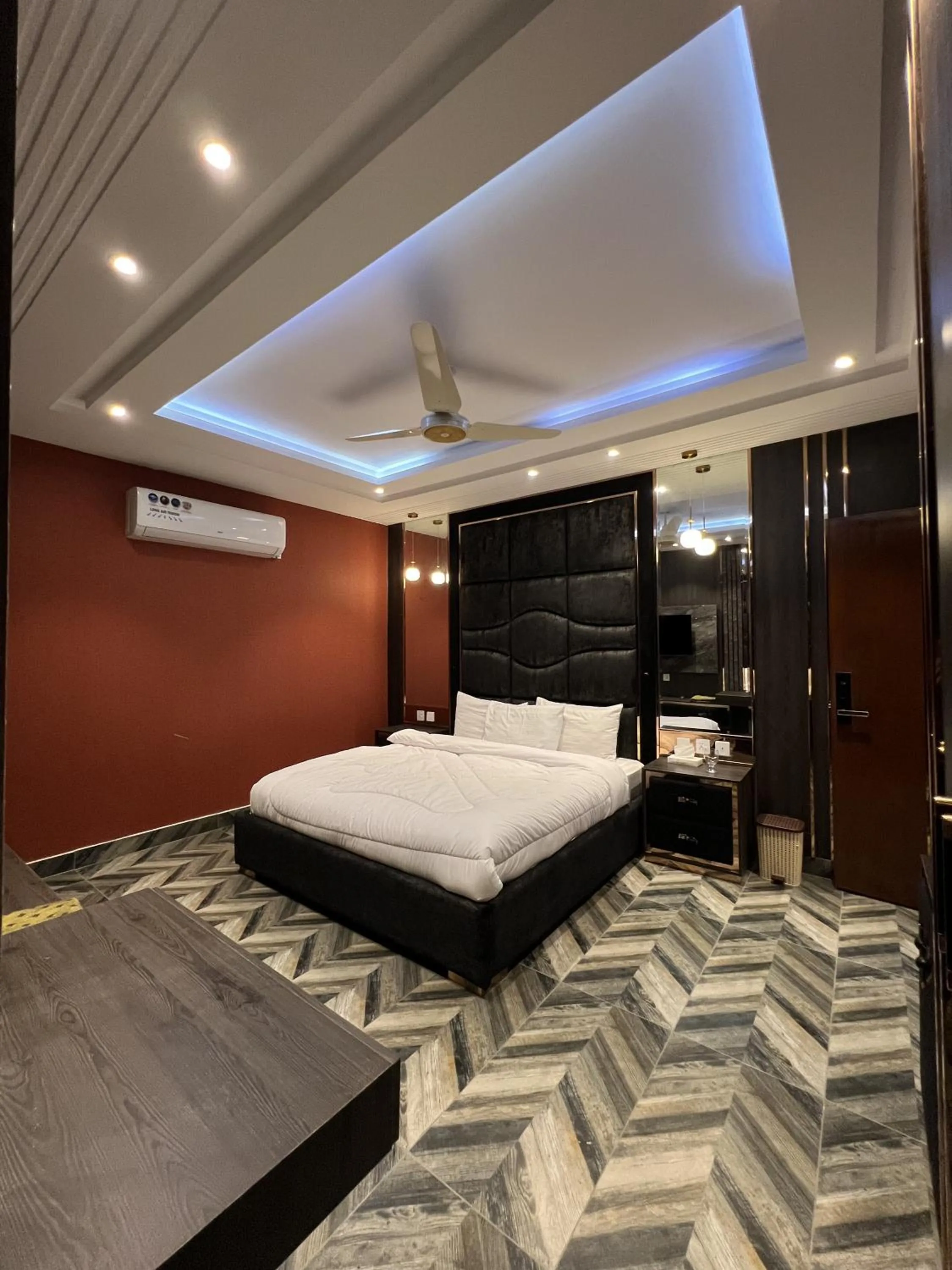 Bed in Courteous Hotel