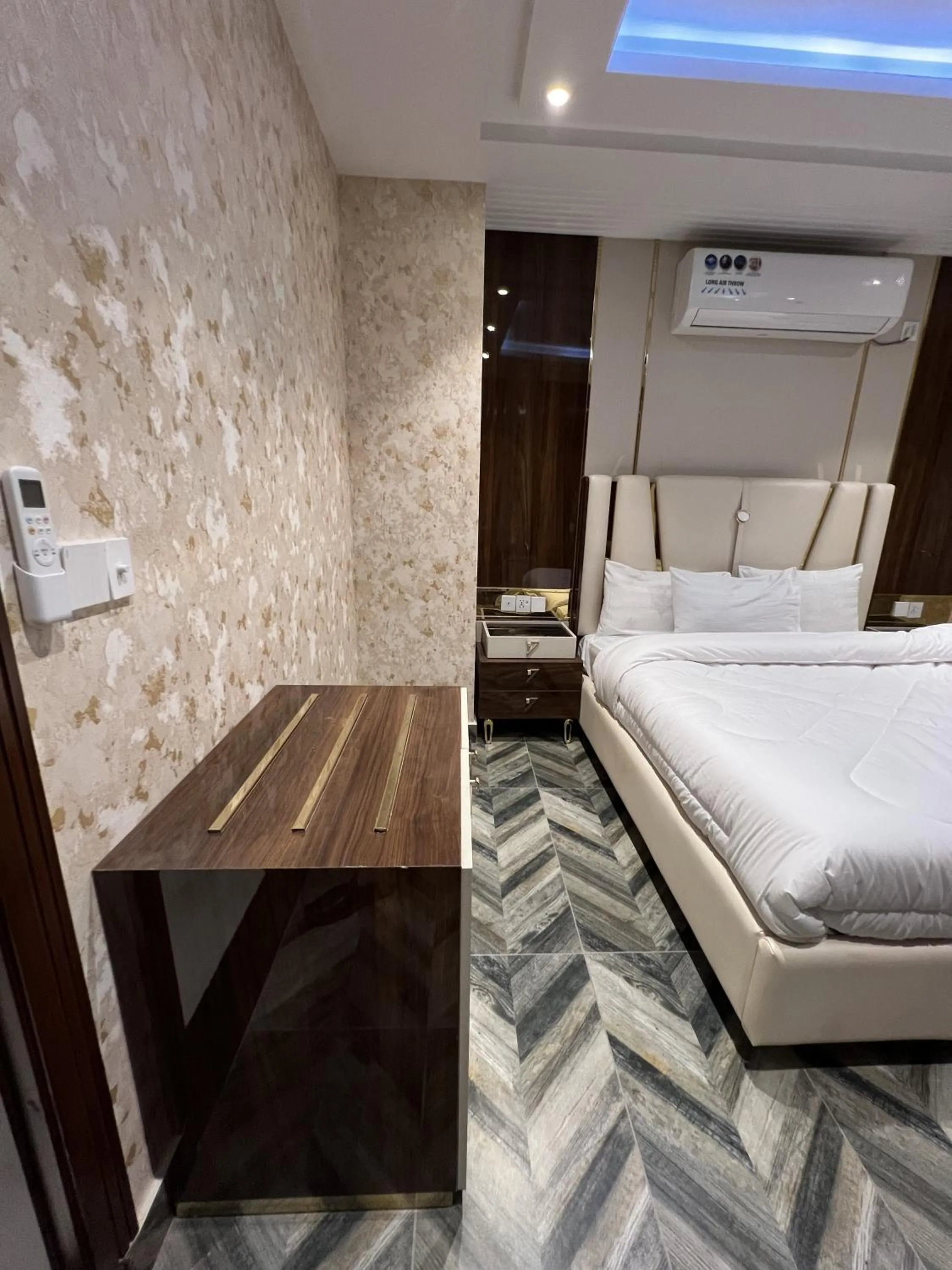 Bed in Courteous Hotel