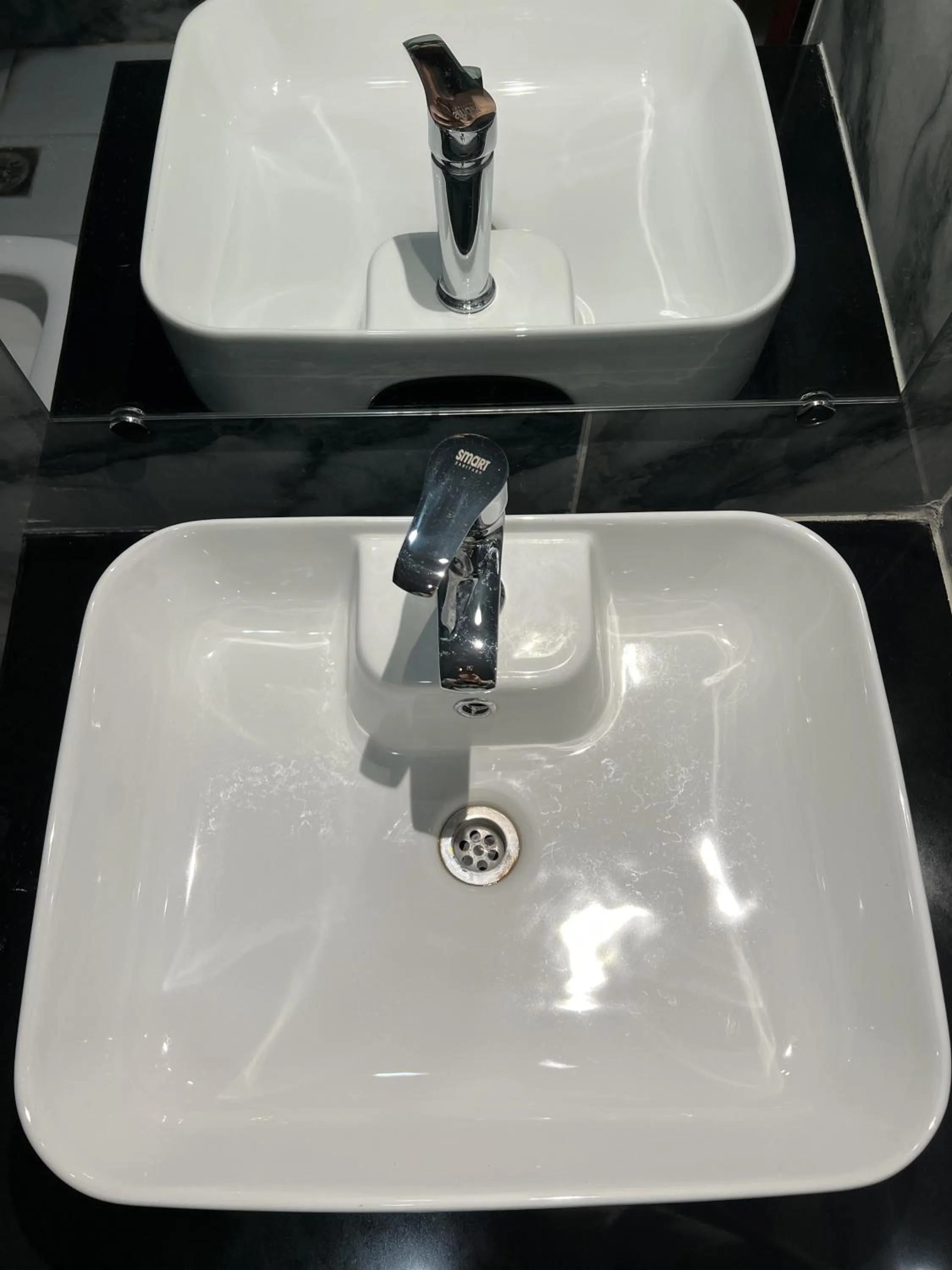 Bathroom in Courteous Hotel