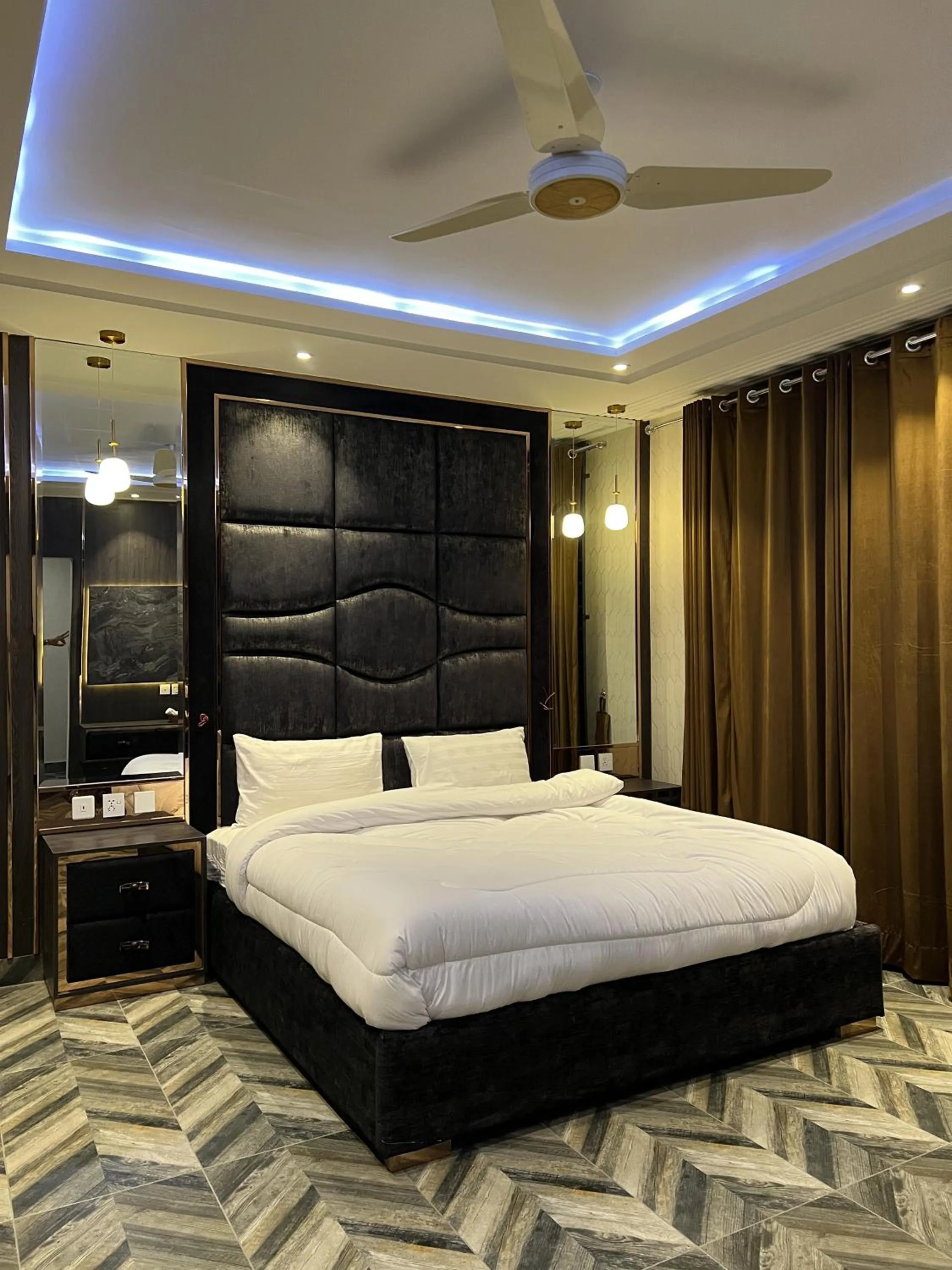 Bed in Courteous Hotel