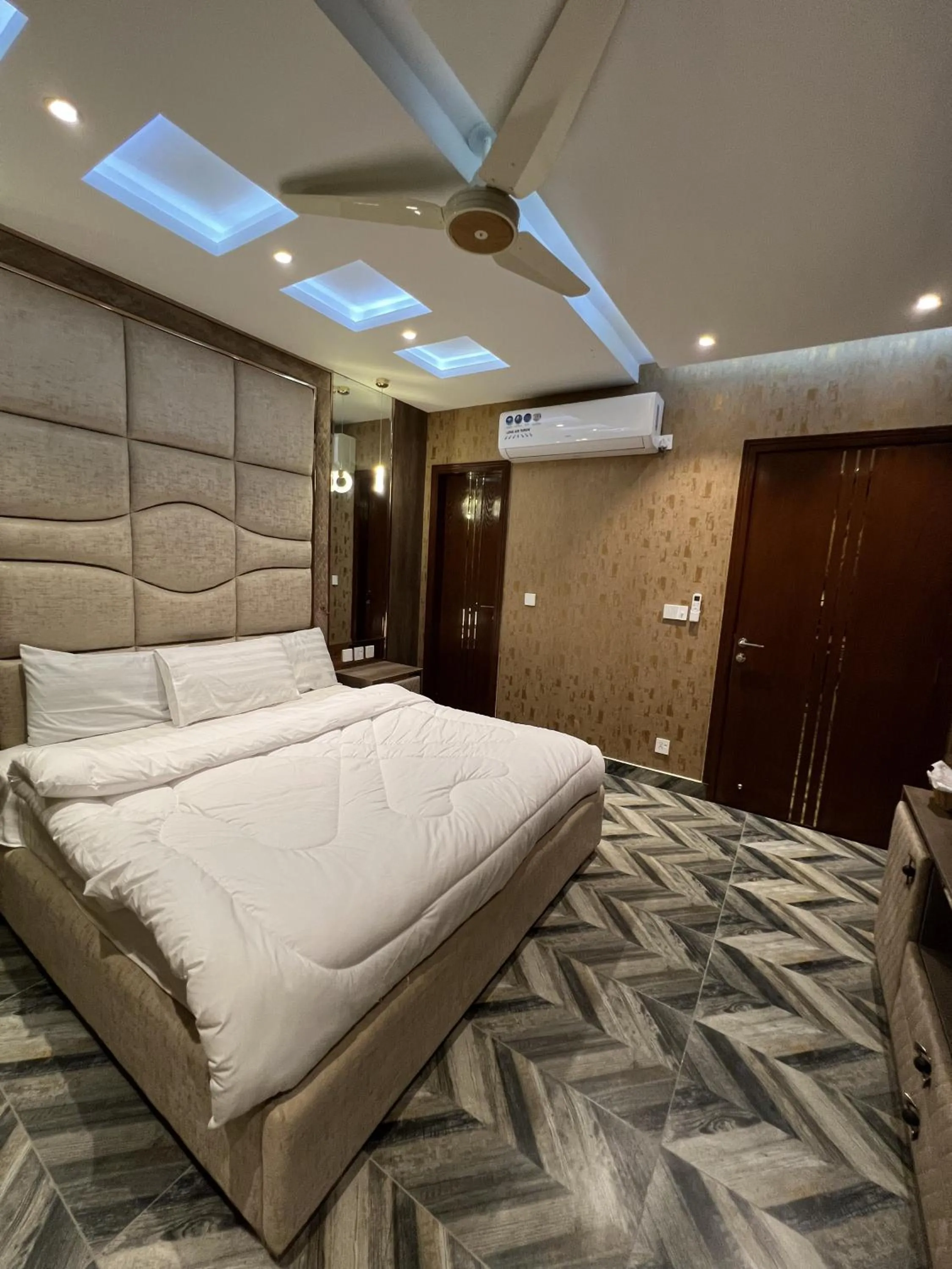 Bed in Courteous Hotel