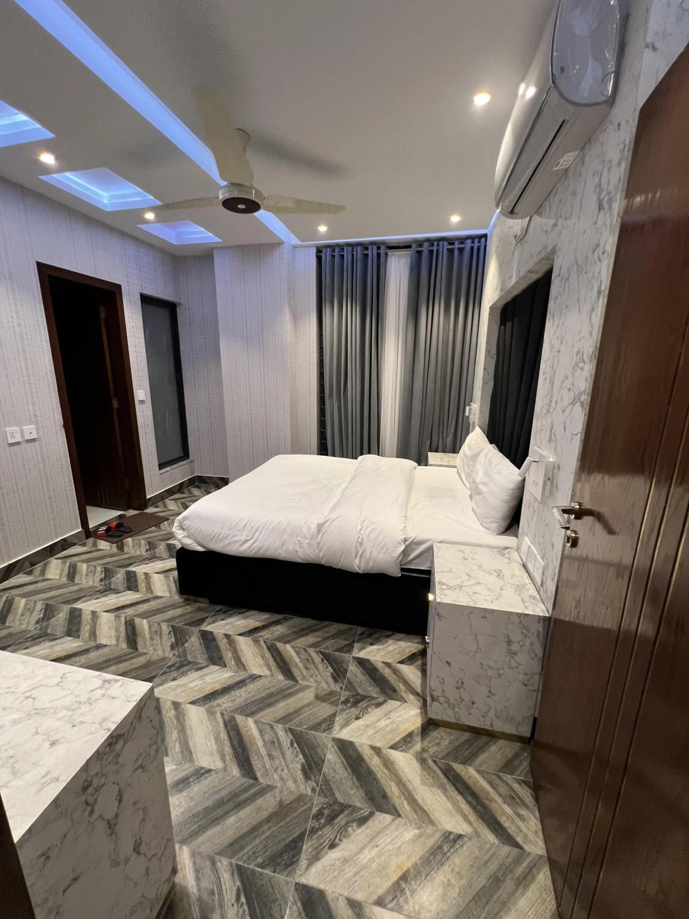 Bed in Courteous Hotel