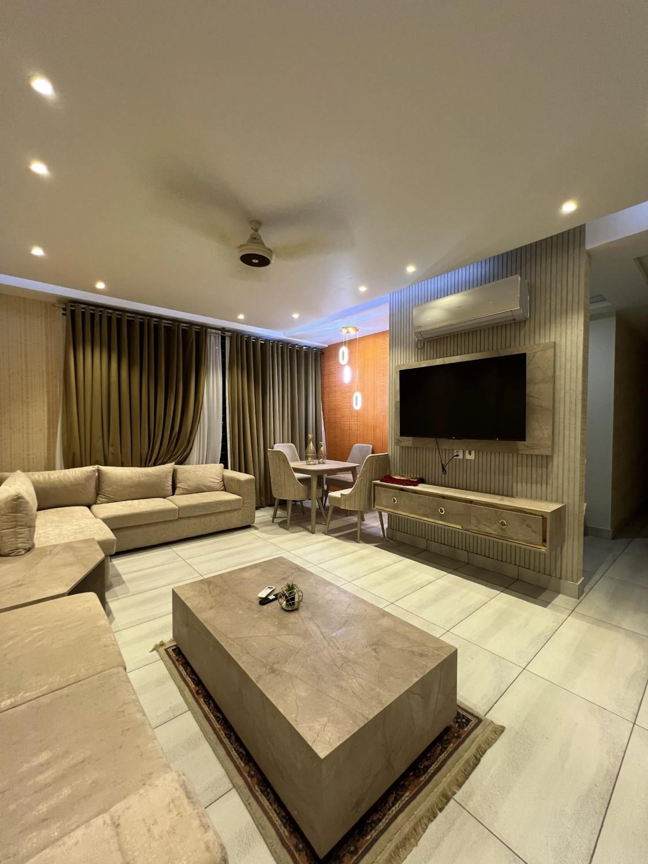Communal lounge/ TV room in Courteous Hotel