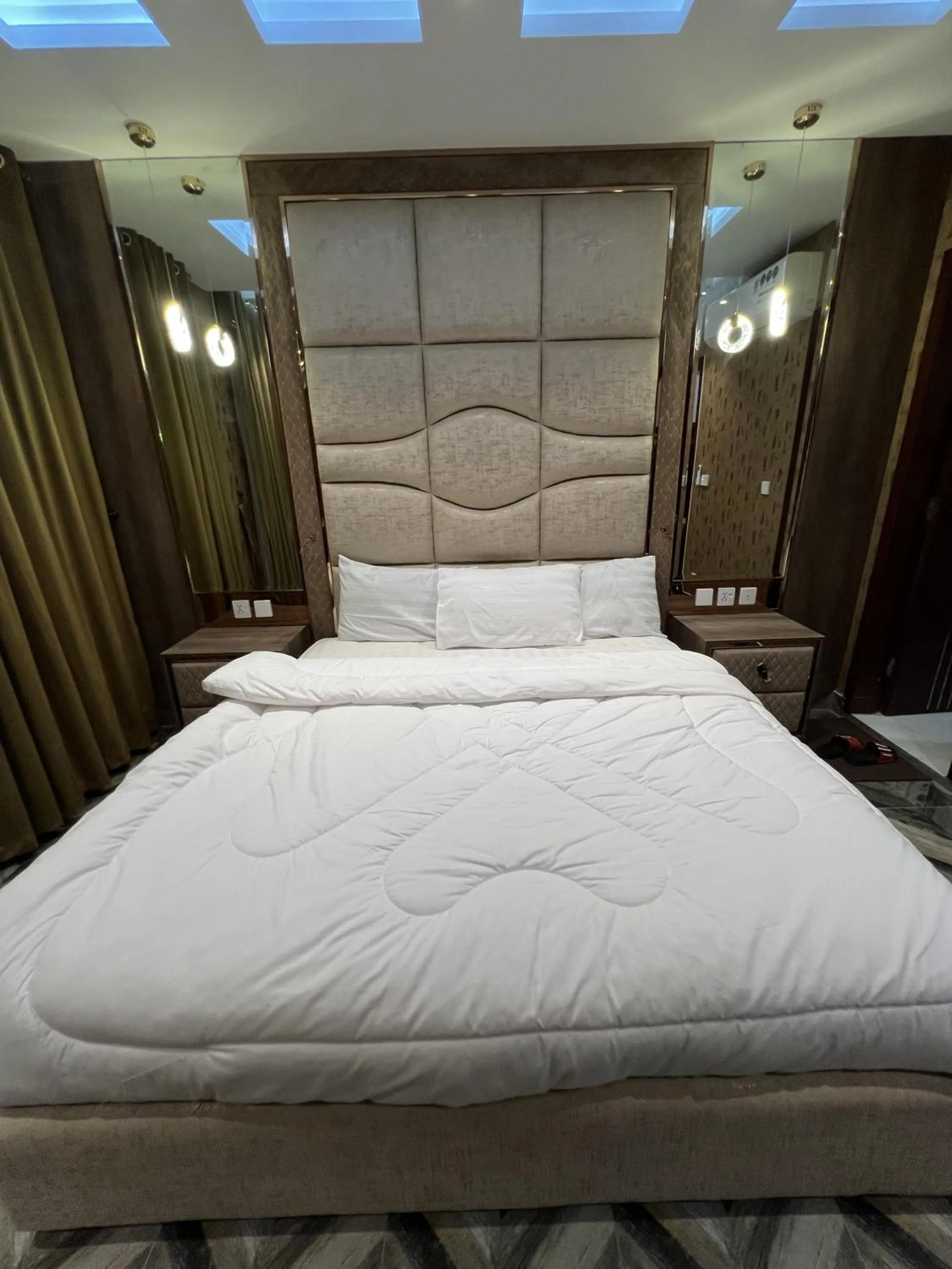 Bed in Courteous Hotel