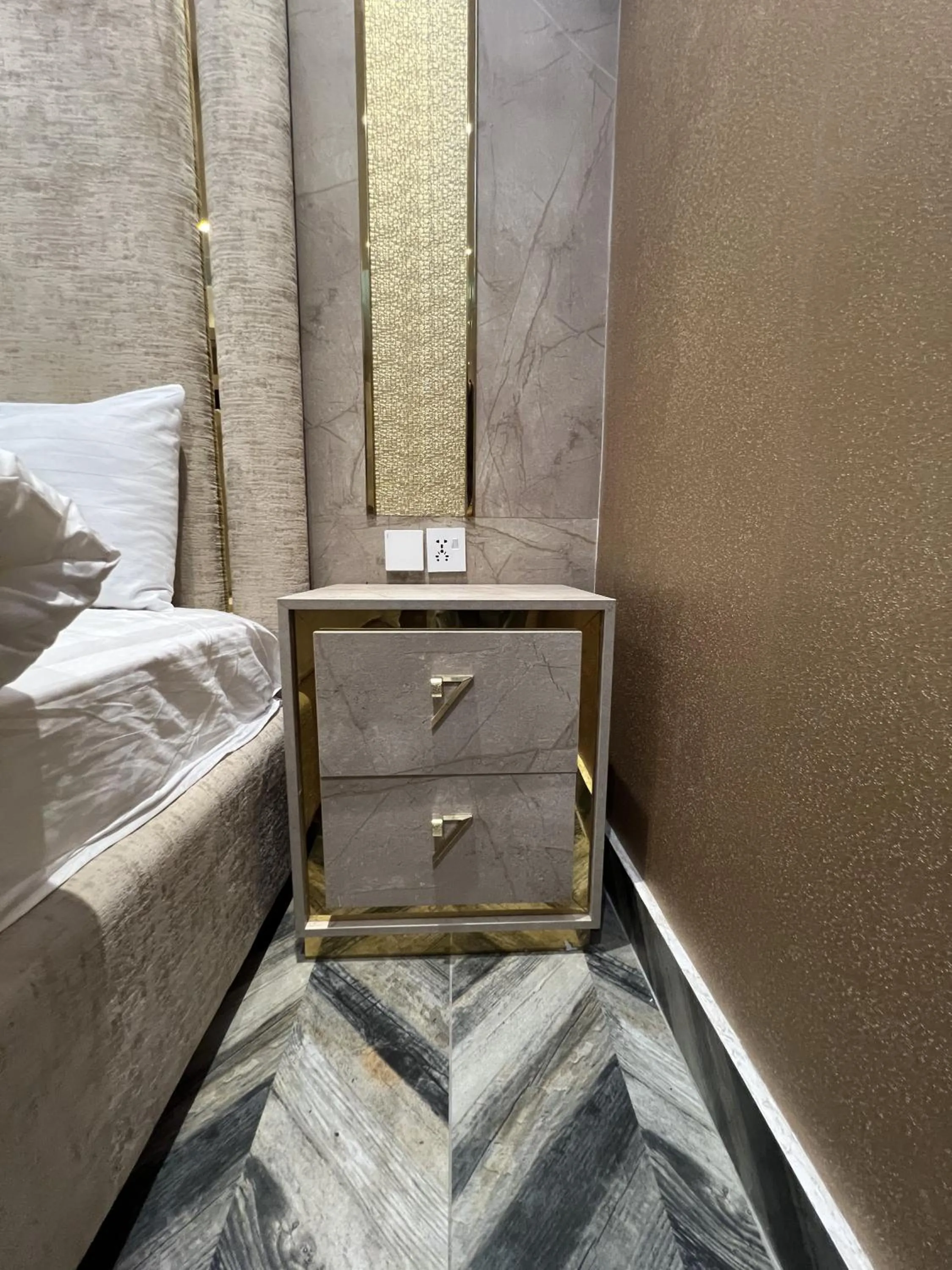Bed in Courteous Hotel