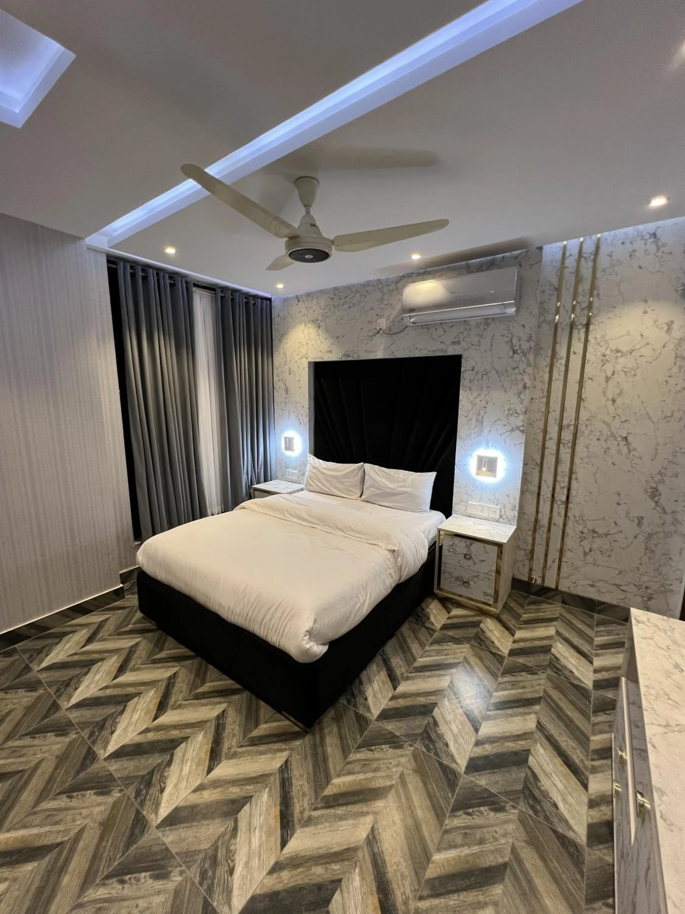 Bed in Courteous Hotel