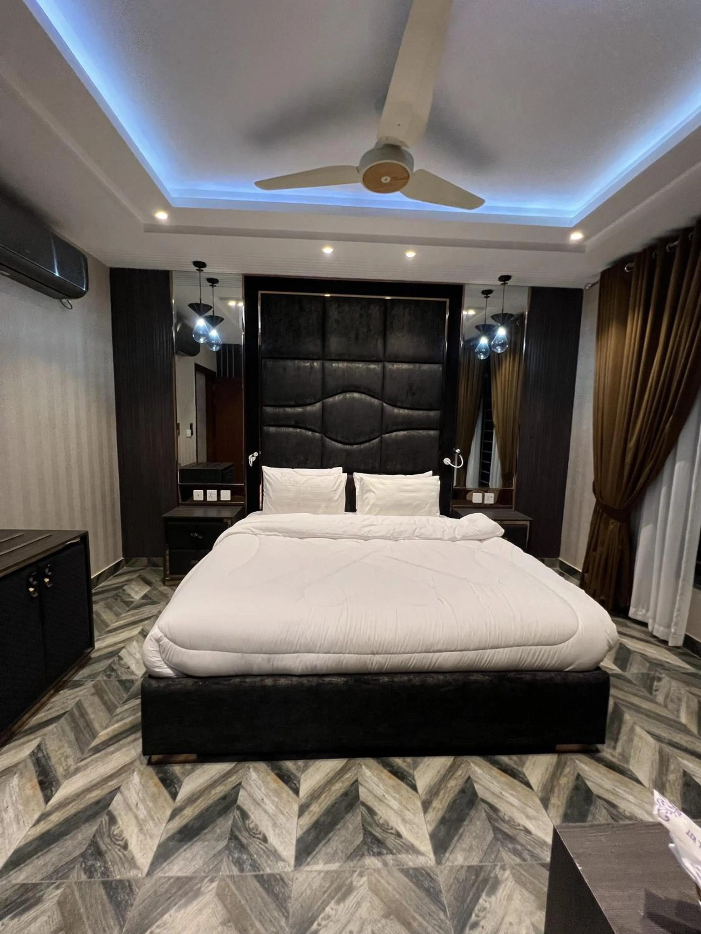 Bed in Courteous Hotel