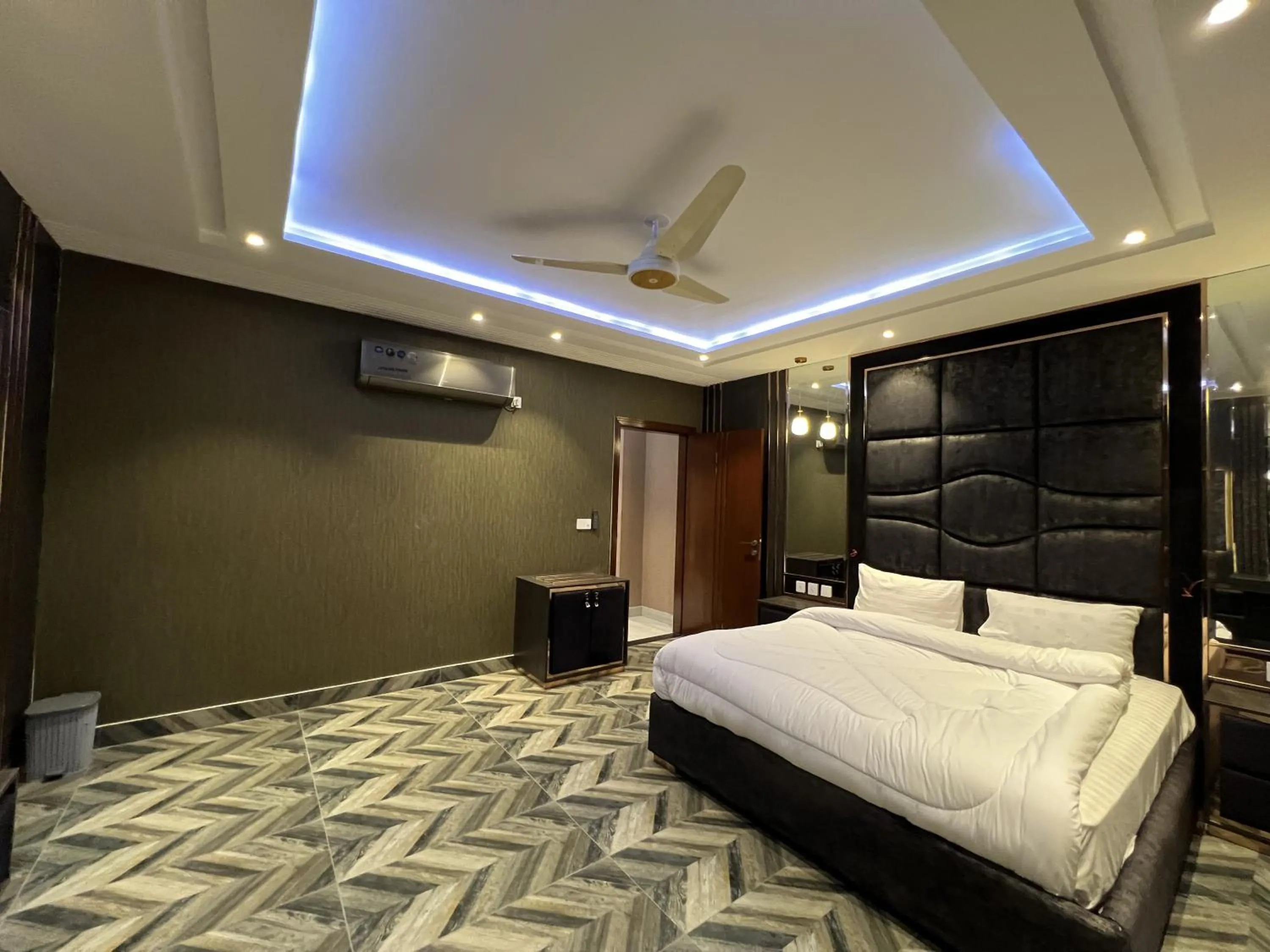 Bed in Courteous Hotel